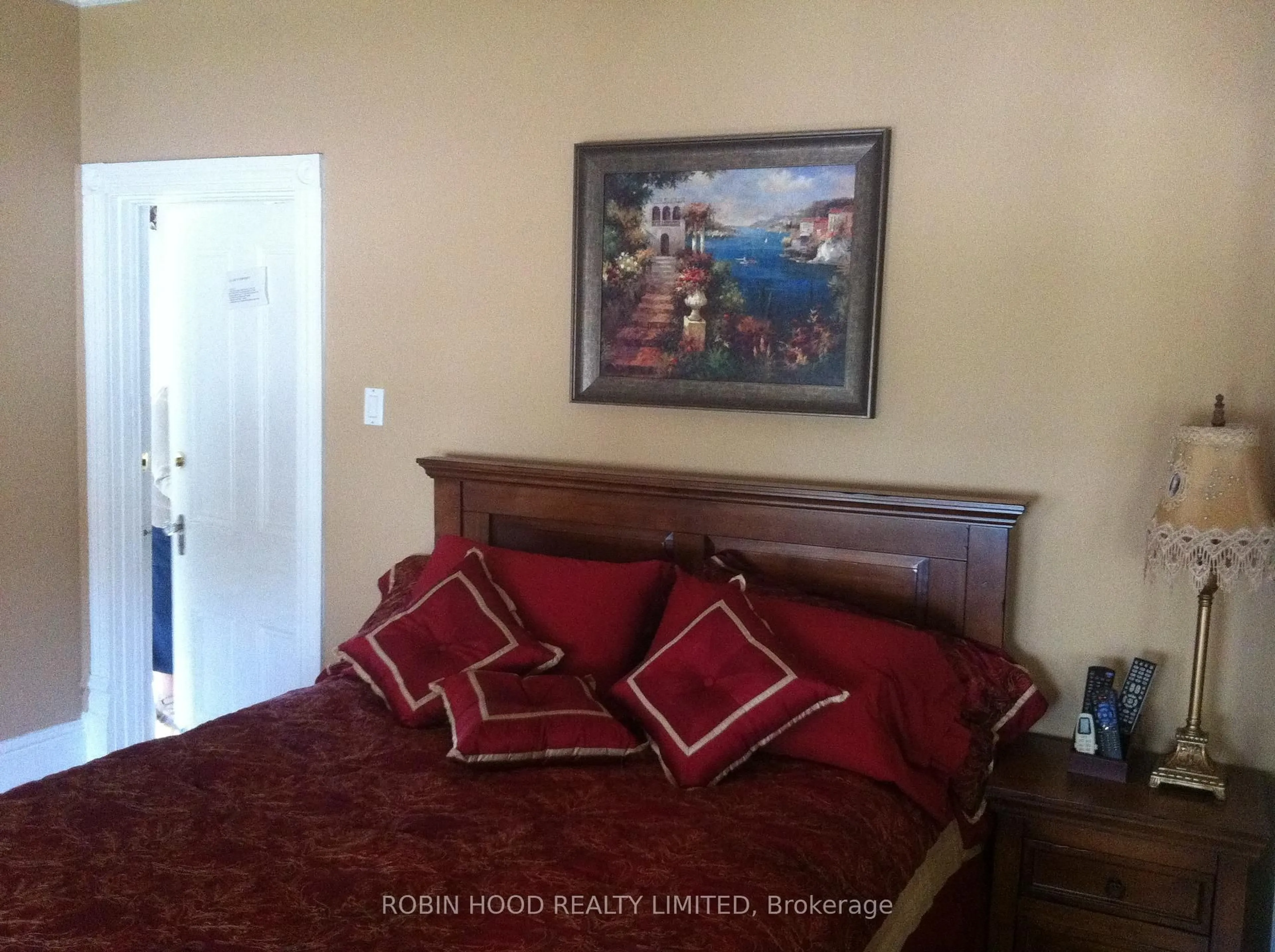 Bedroom with bed, wood/laminate floor for 219 Mornington St, Stratford Ontario N5A 5G4