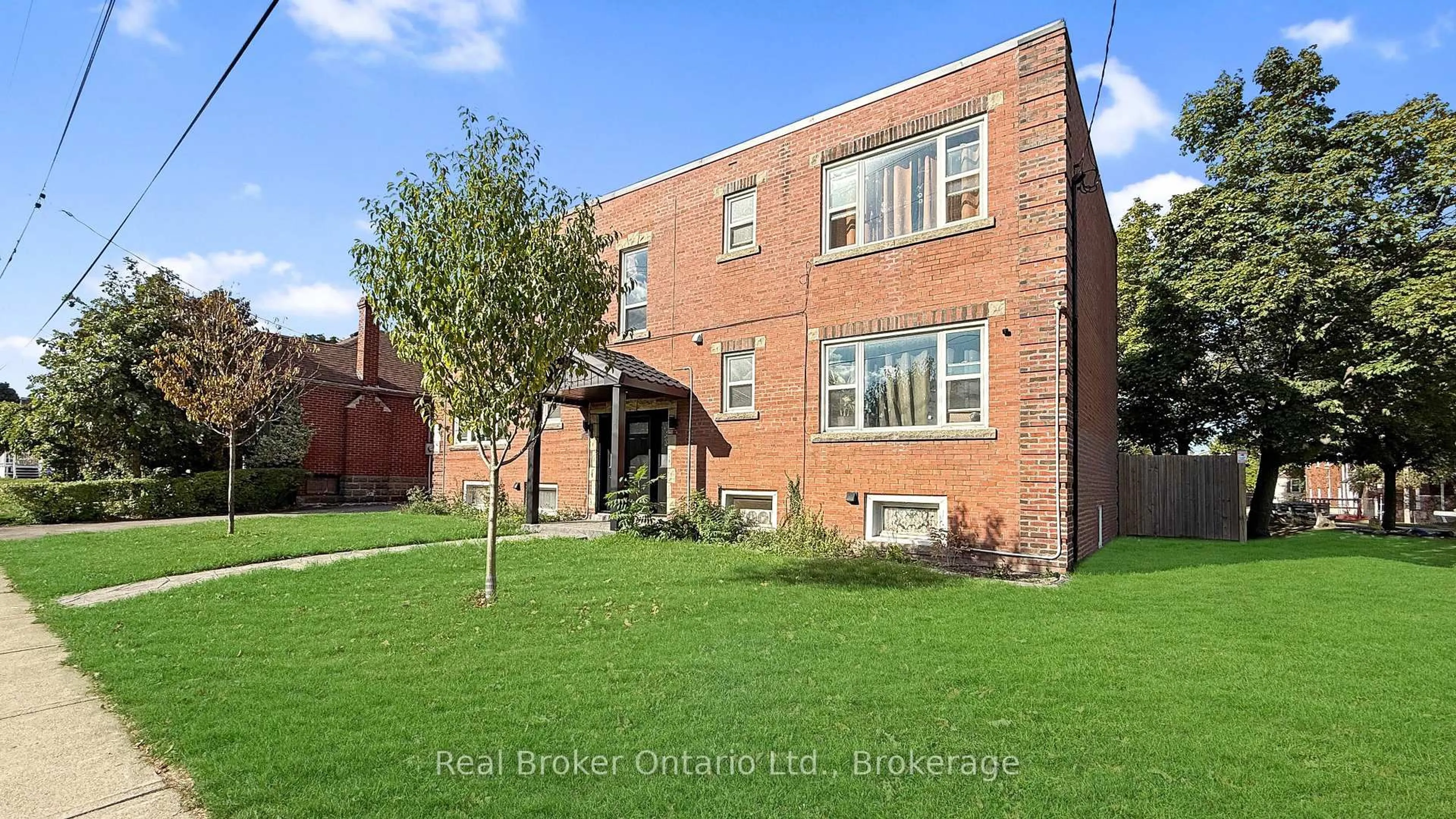 Home with brick exterior material, building for 309 Strathearne Ave, Hamilton Ontario L8H 5K8