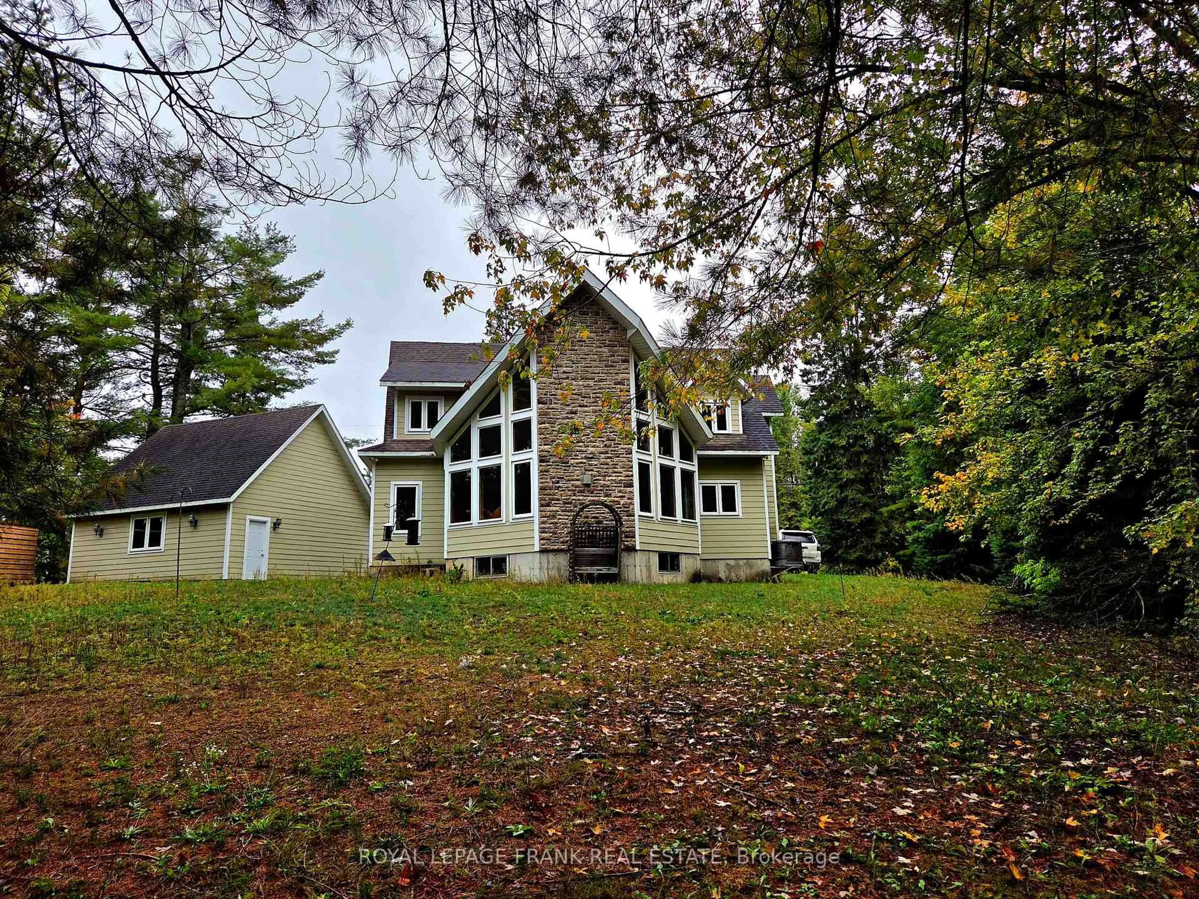 A pic from outside/outdoor area/front of a property/back of a property/a pic from drone, unknown for 8847 Highway 28, North Kawartha Ontario K0L 1A0