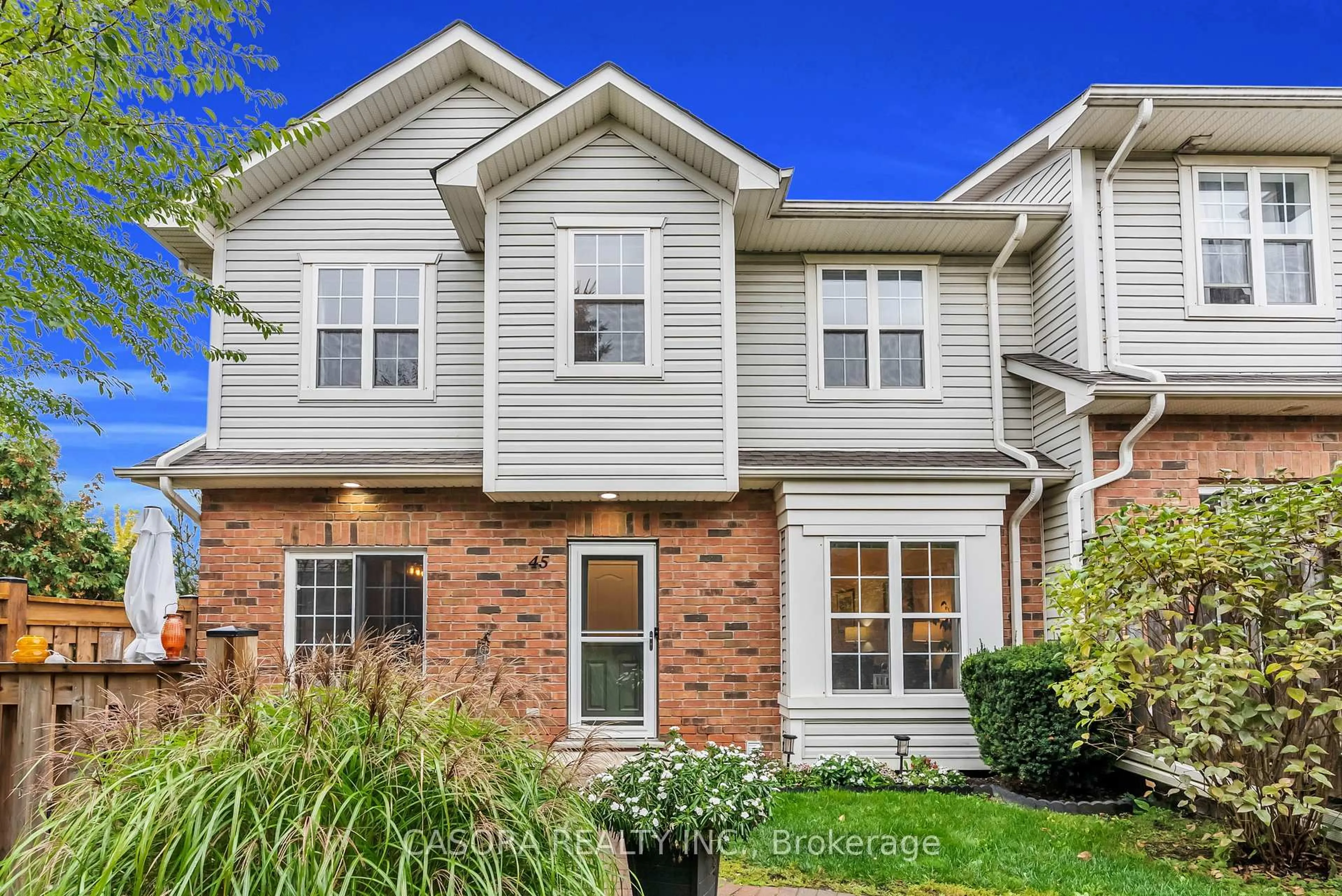Home with brick exterior material, street for 1085 Harrogate Dr #45, Hamilton Ontario L9K 1R2