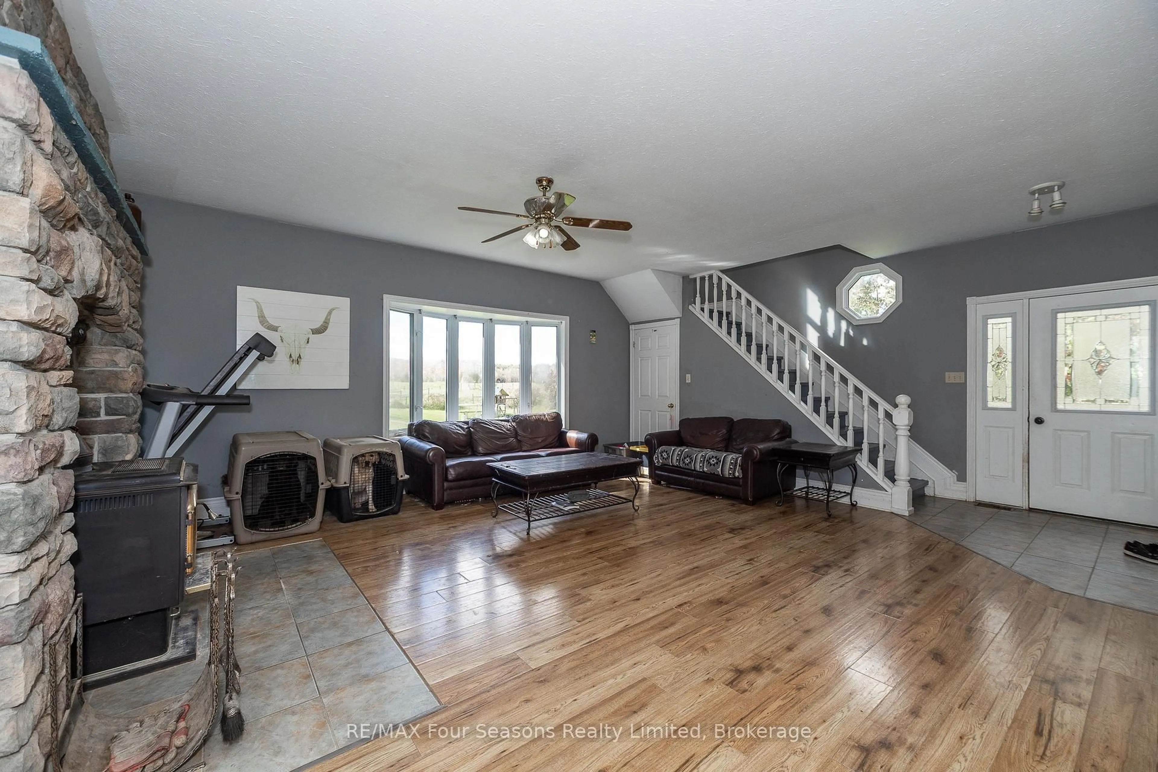 Living room with furniture, unknown for 734316 West Back Line Rd, Grey Highlands Ontario N0C 1E0