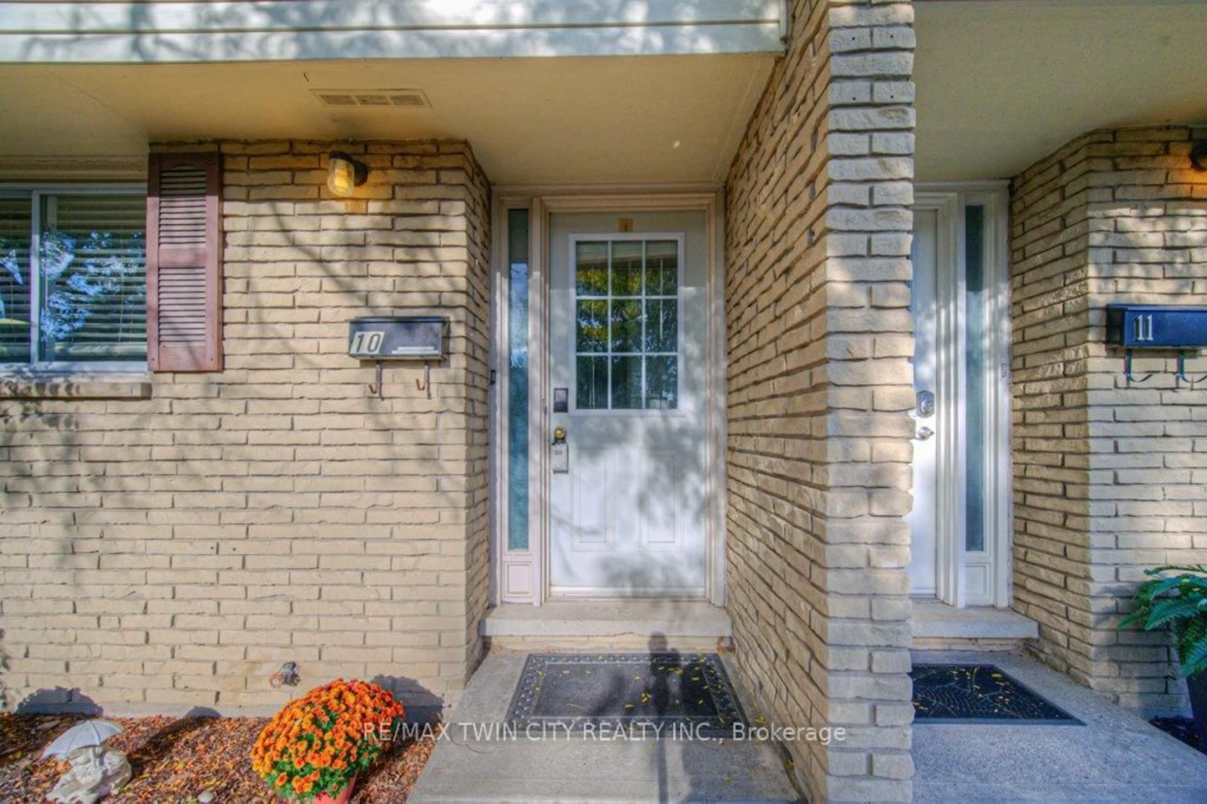 Home with brick exterior material, street for 211 Veronica Dr #10, Kitchener Ontario N2A 2R8