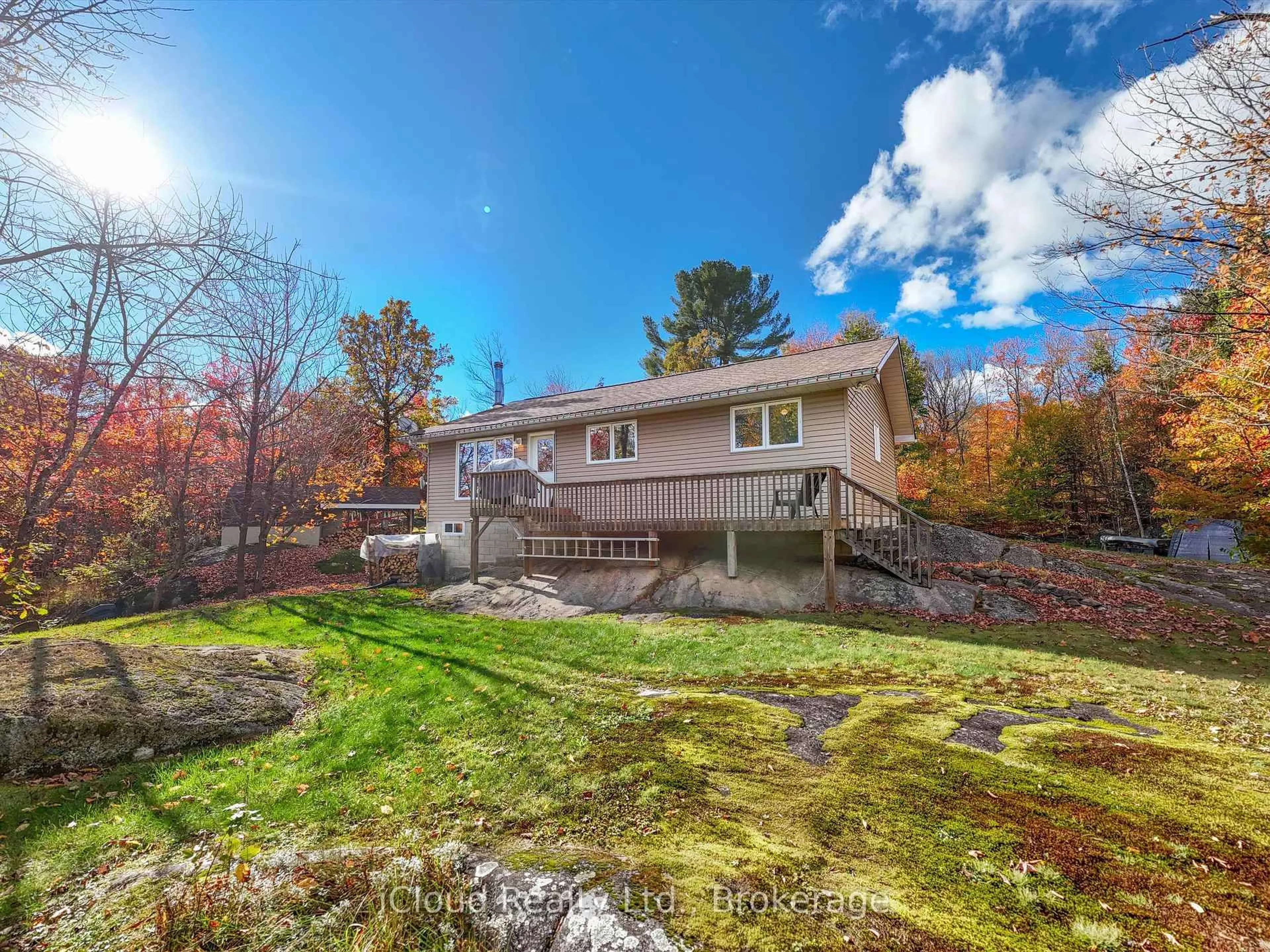 A pic from outside/outdoor area/front of a property/back of a property/a pic from drone, water/lake/river/ocean view for 6 Springhill Rd, McKellar Ontario P0A 1G0
