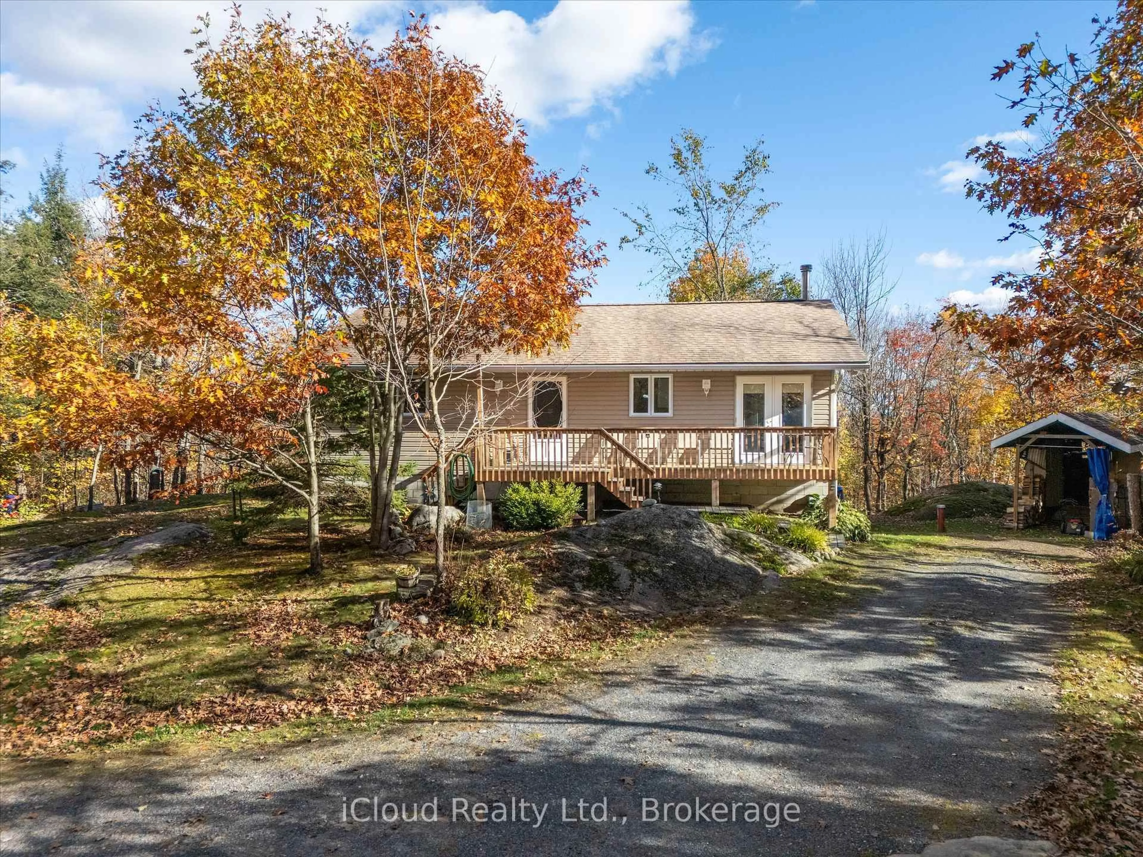 A pic from outside/outdoor area/front of a property/back of a property/a pic from drone, water/lake/river/ocean view for 6 Springhill Rd, McKellar Ontario P0A 1G0