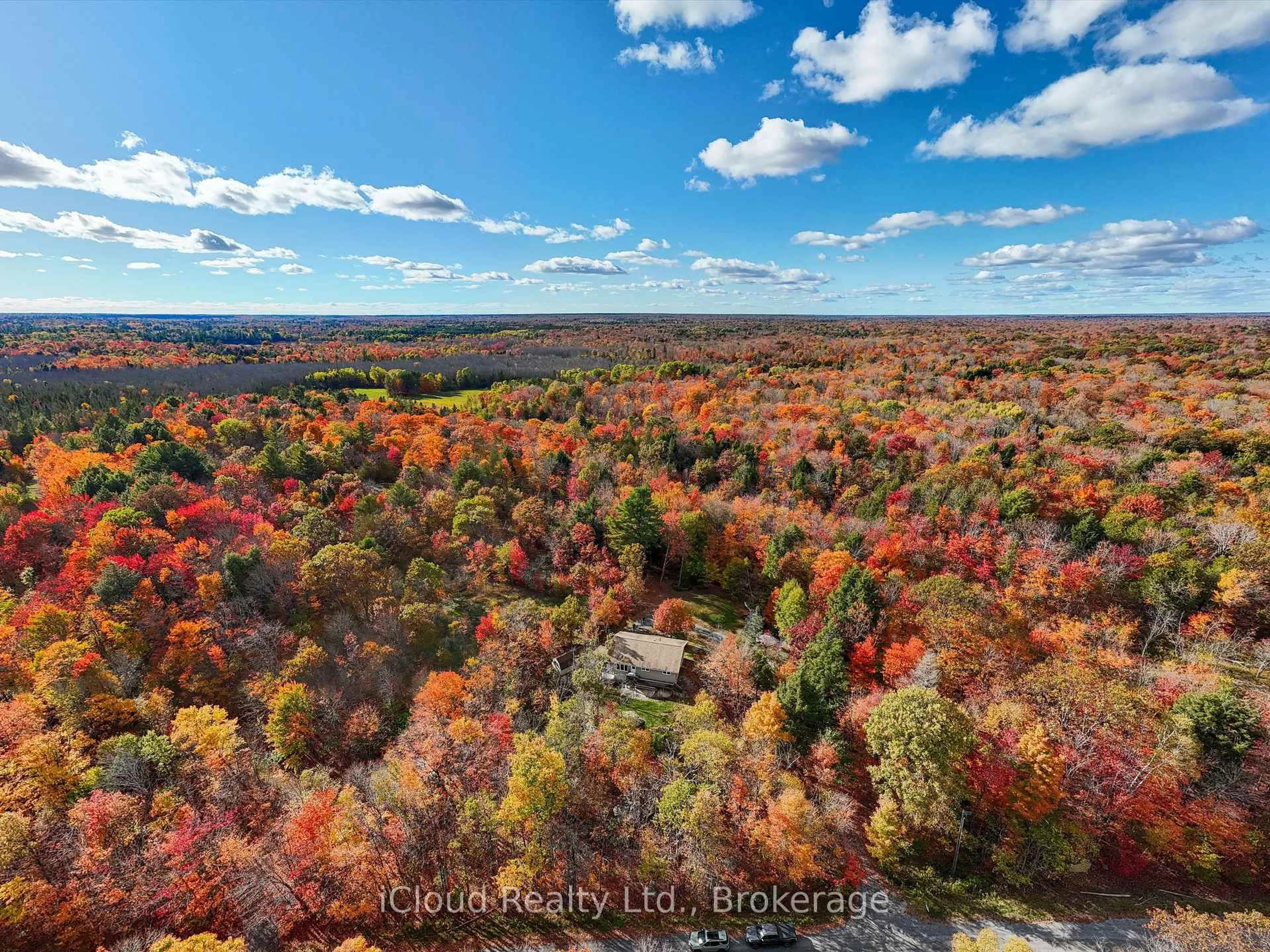 A pic from outside/outdoor area/front of a property/back of a property/a pic from drone, forest/trees view for 6 Springhill Rd, McKellar Ontario P0A 1G0