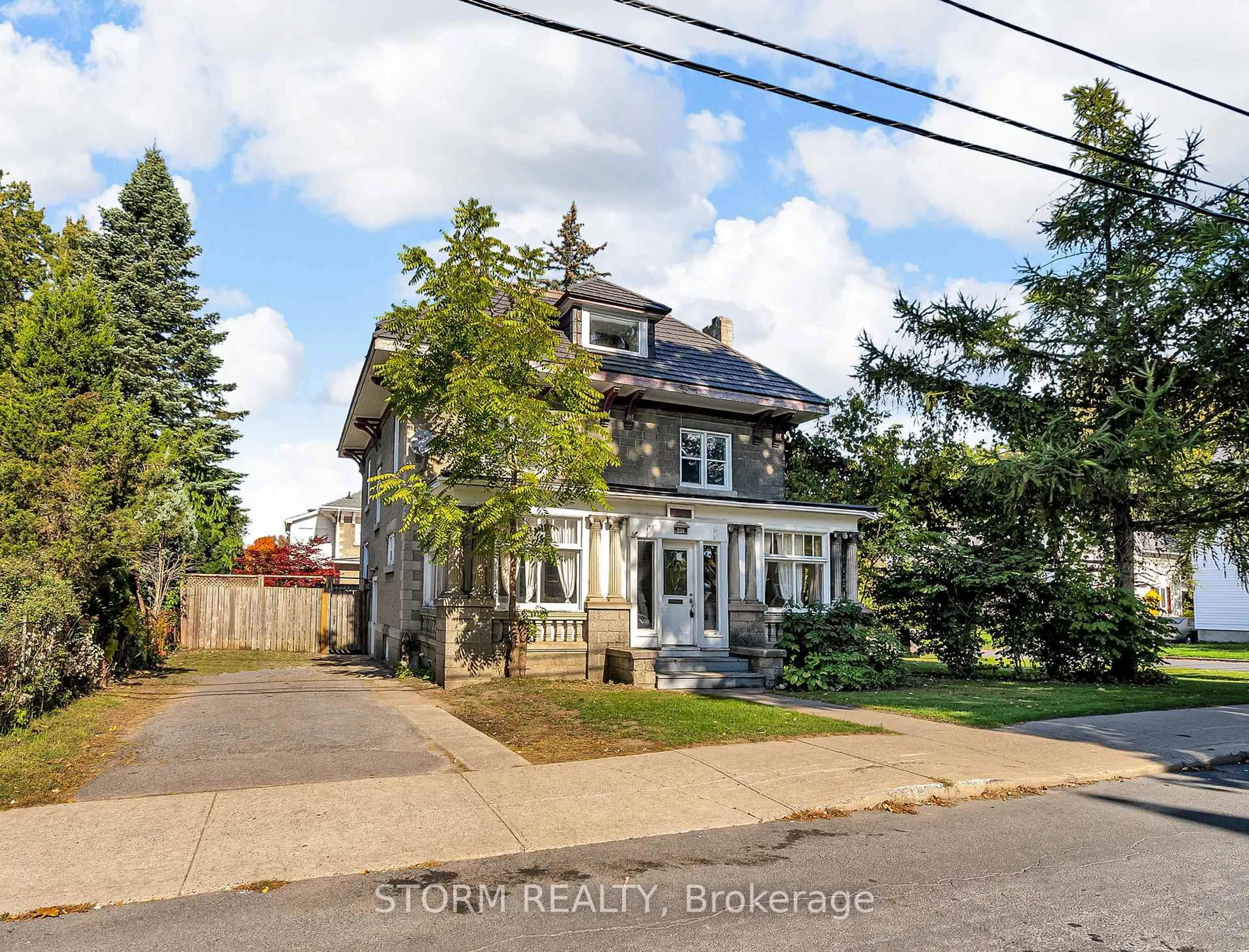 A pic from outside/outdoor area/front of a property/back of a property/a pic from drone, street for 239 1st St, Cornwall Ontario K6H 1K9