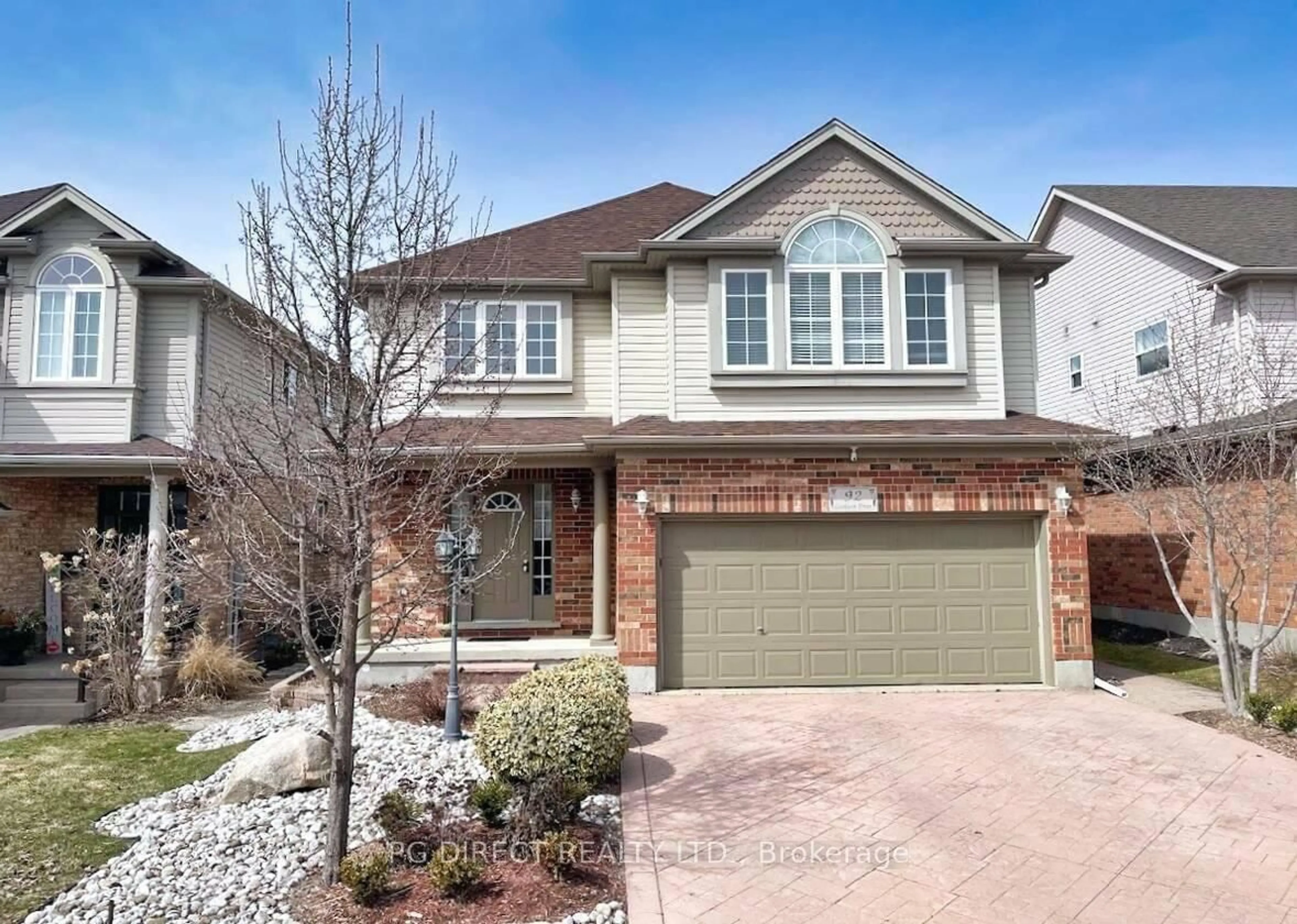 Home with brick exterior material, street for 92 Goodwin Dr, Guelph Ontario N1L 1T8