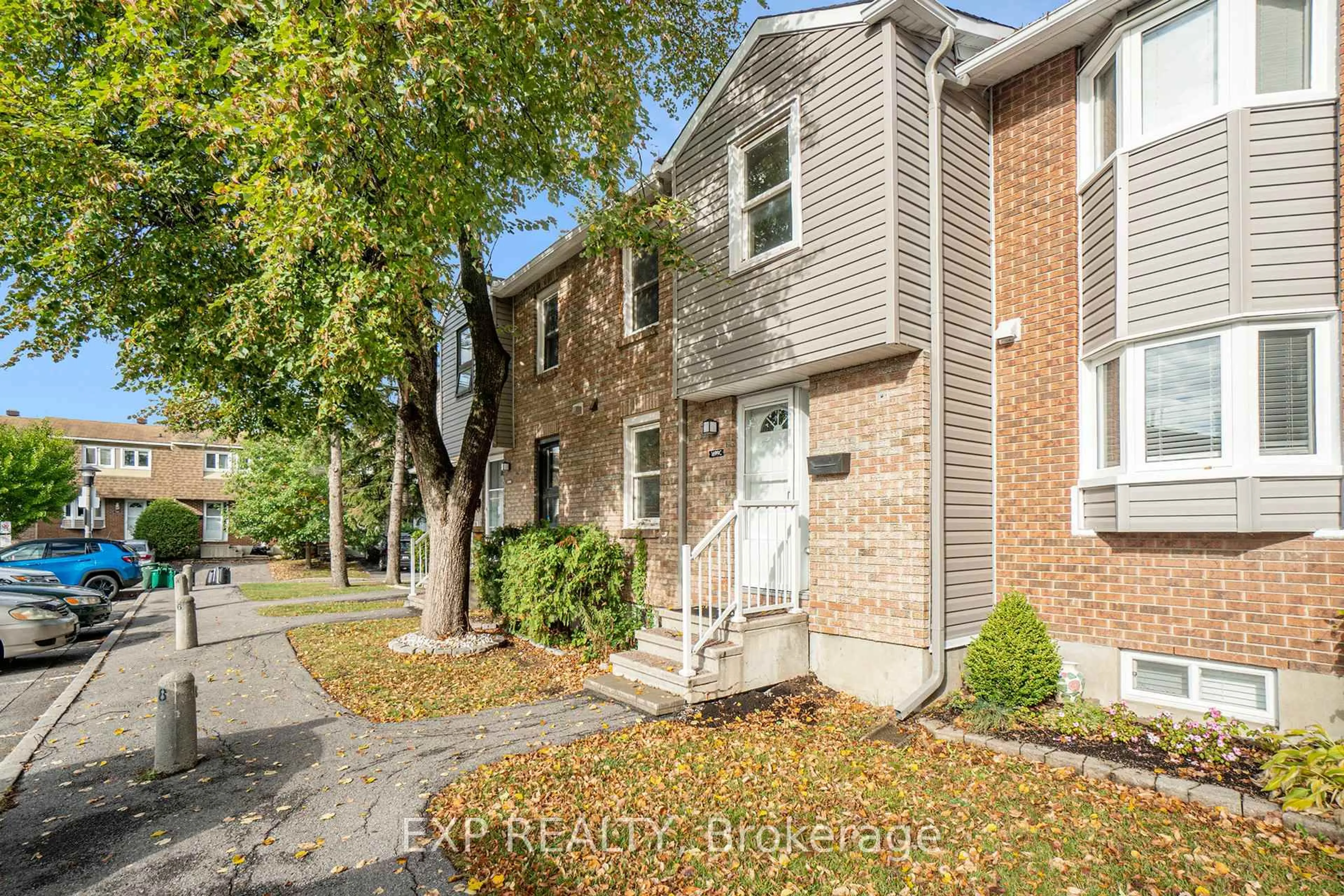 Home with brick exterior material, street for 1699C Lamoureux Dr #C, Ottawa Ontario K1E 2N3