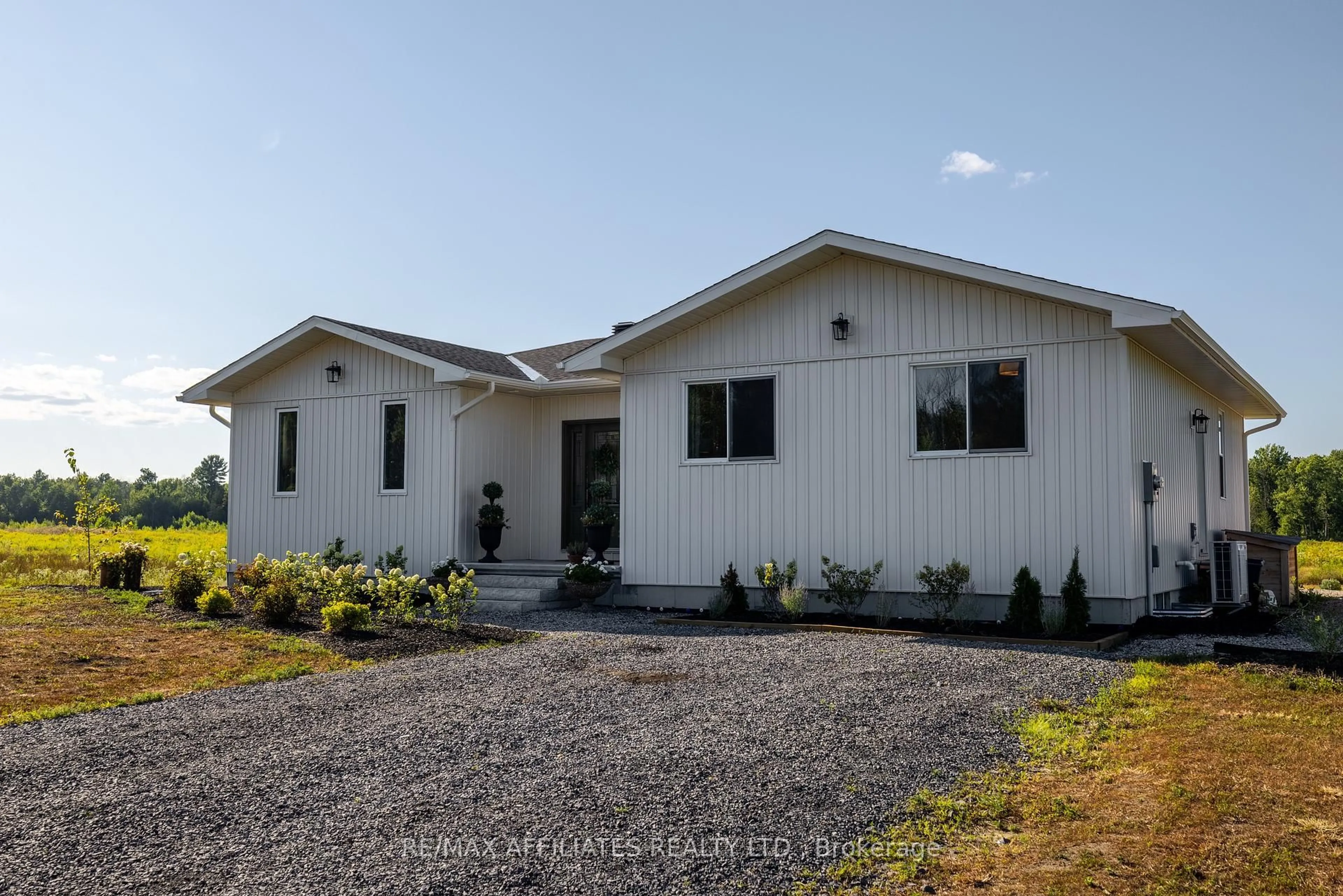 Home with vinyl exterior material, street for 1606 Pittston Rd, Edwardsburgh/Cardinal Ontario K0E 1X0
