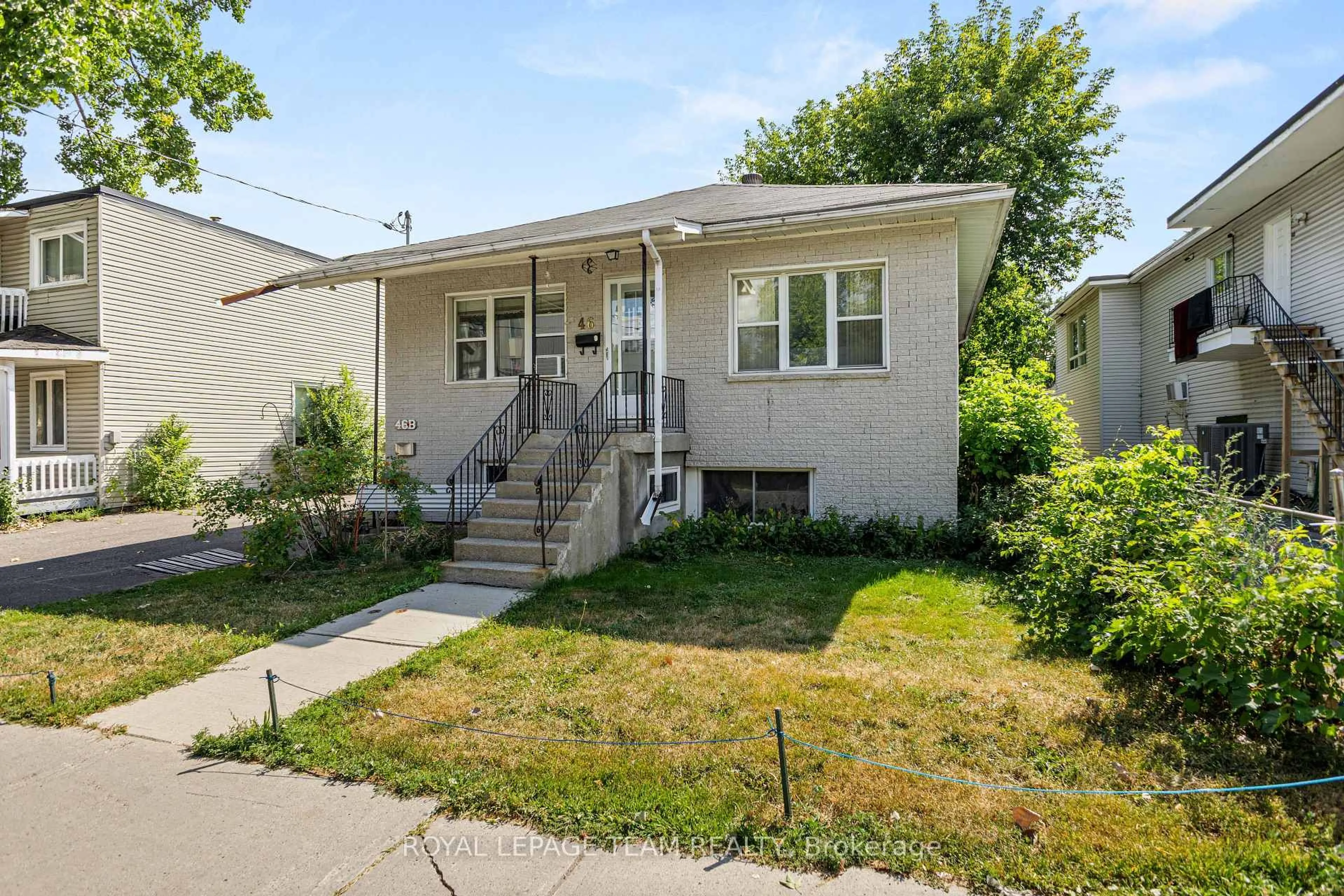 Home with vinyl exterior material, street for 46 Jolliet Ave, Ottawa Ontario K1L 5H5
