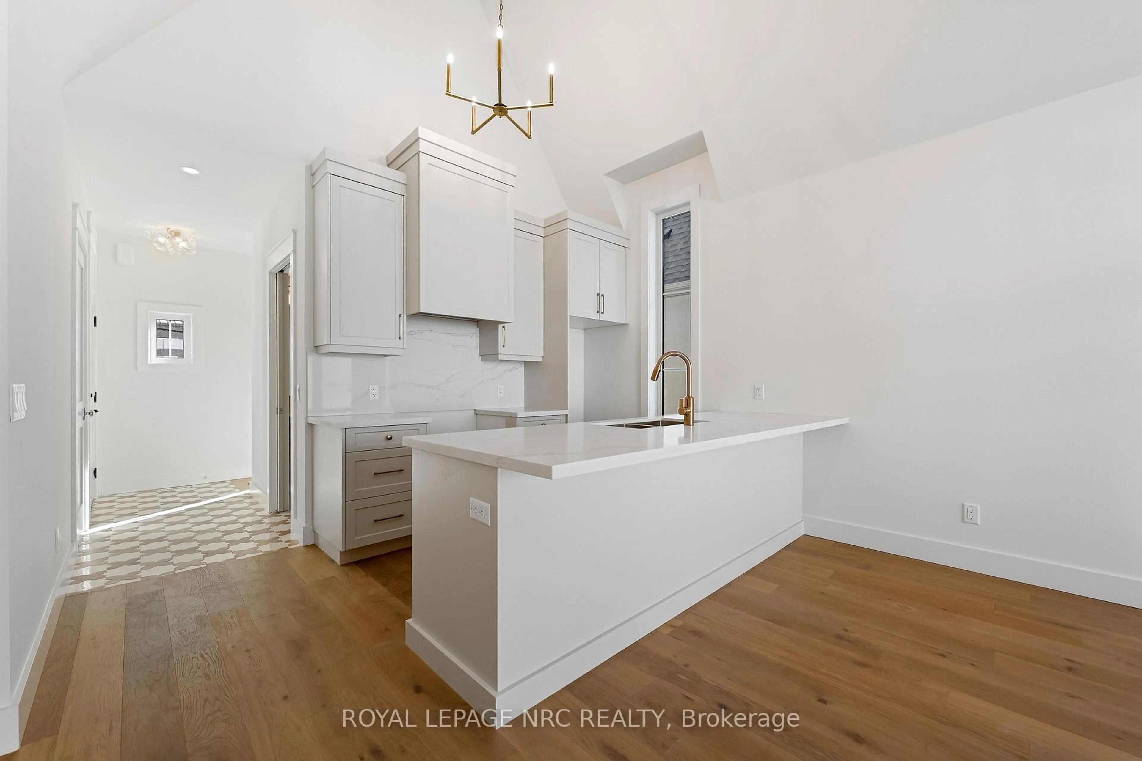 Open concept kitchen, wood/laminate floor for 281 ELMWOOD Ave, Fort Erie Ontario L0S 1B0