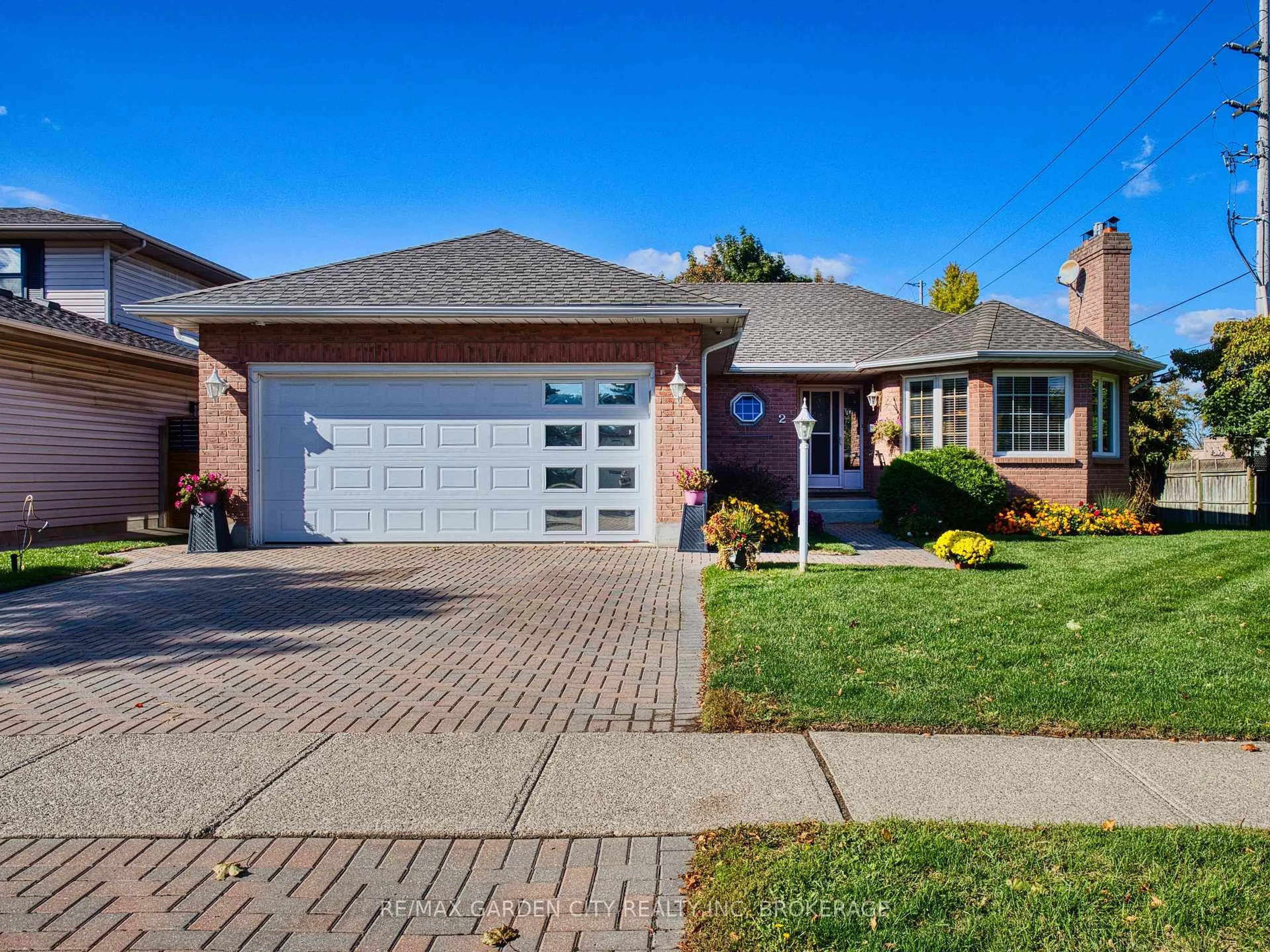 Home with brick exterior material, street for 2 Harvest Oak Dr, St. Catharines Ontario L2S 3H4