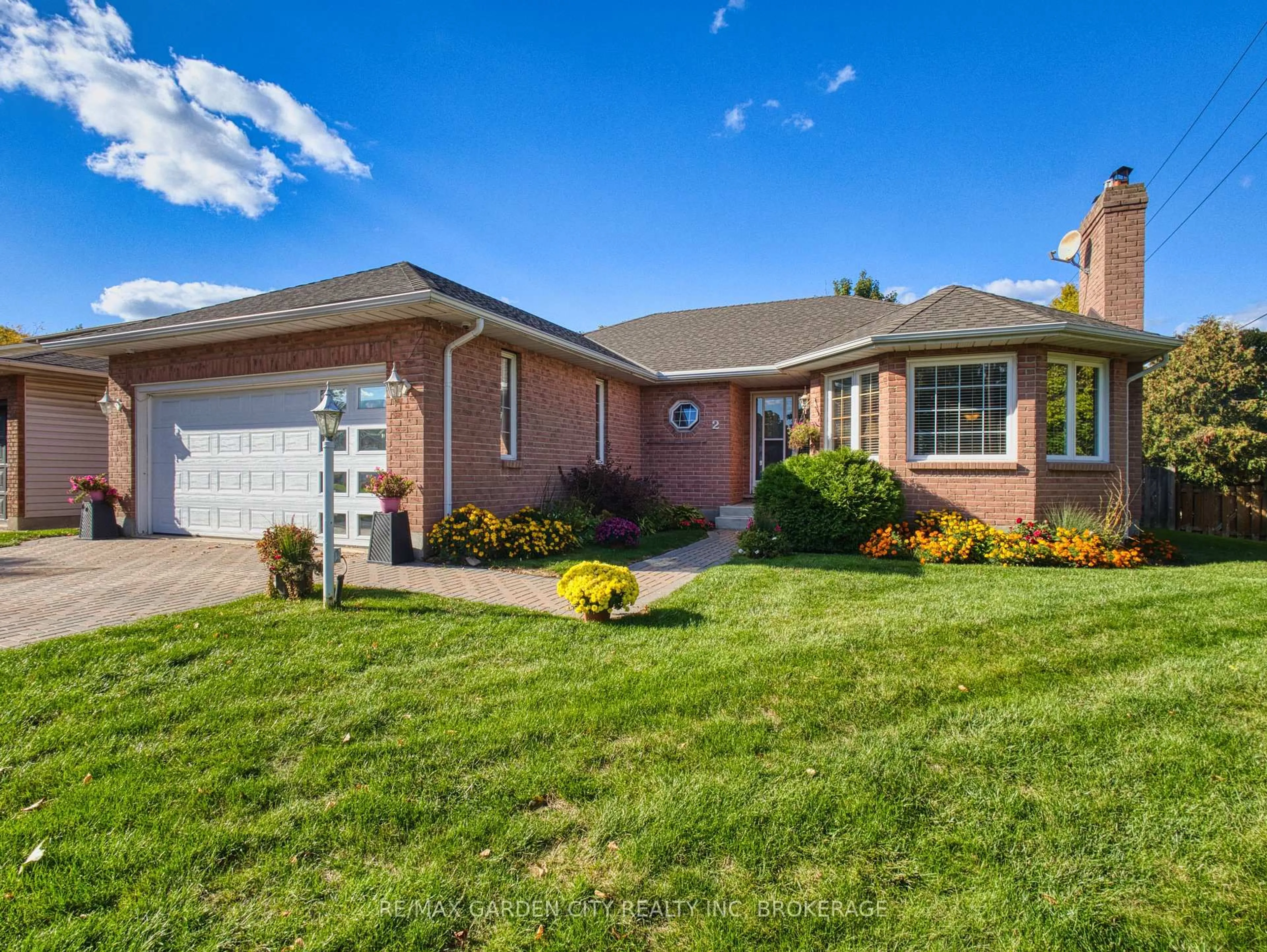 Home with brick exterior material, street for 2 Harvest Oak Dr, St. Catharines Ontario L2S 3H4