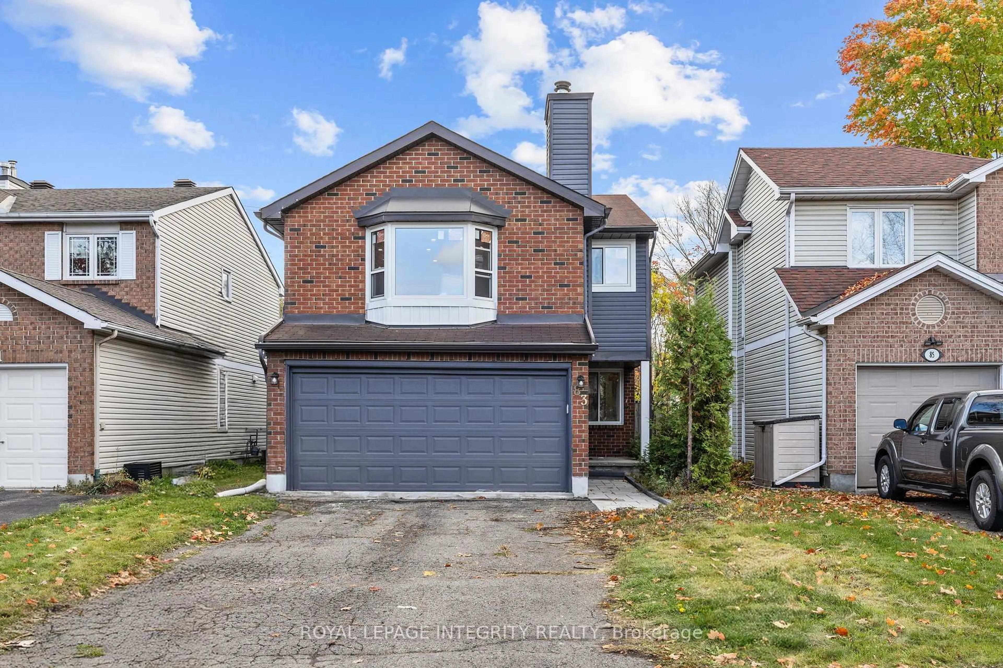 Home with vinyl exterior material, street for 83 Saddle Cres, Ottawa Ontario K1G 5L3