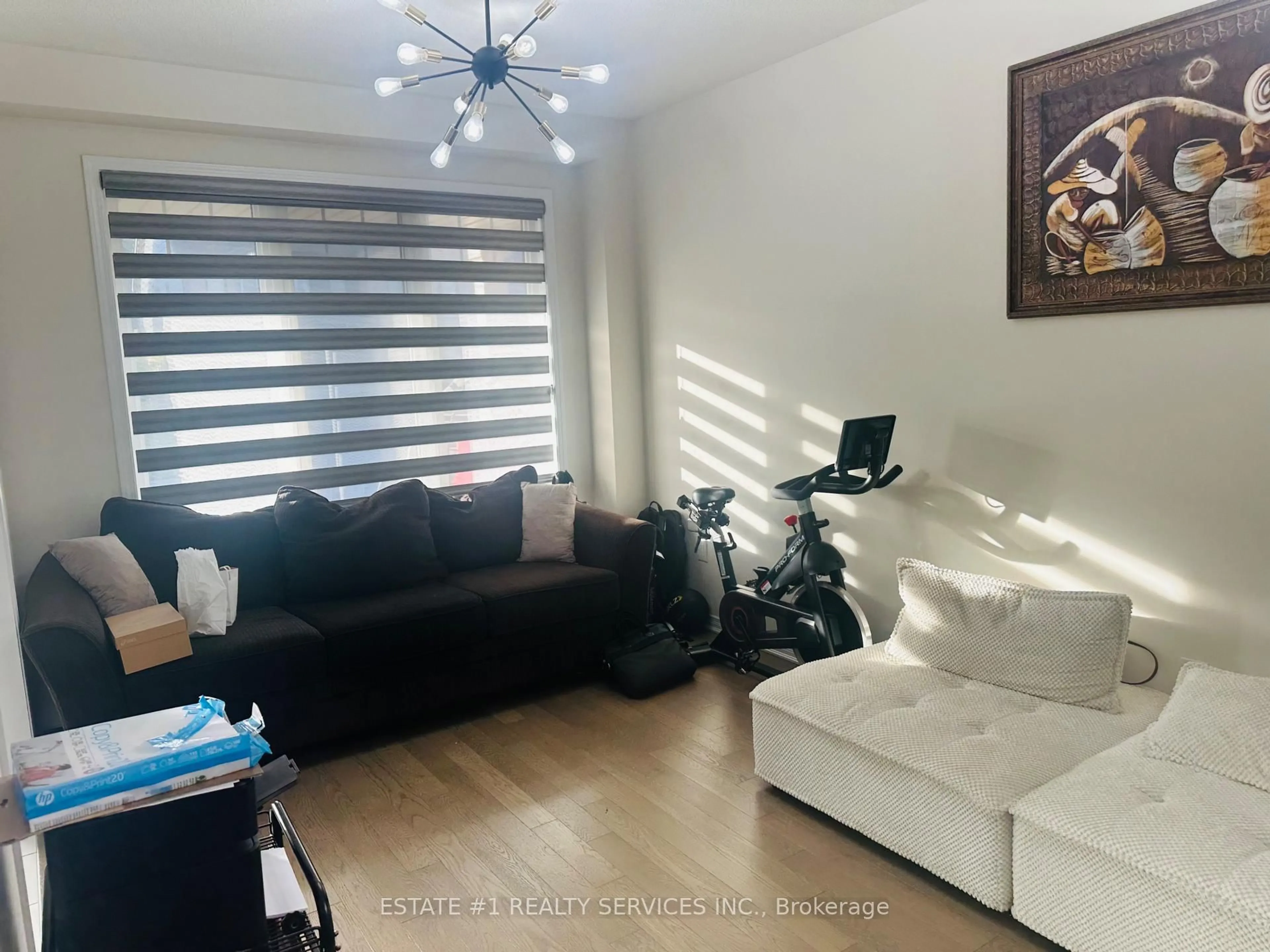 Living room with furniture, wood/laminate floor for 59 July Ave, Hamilton Ontario L8J 0M4