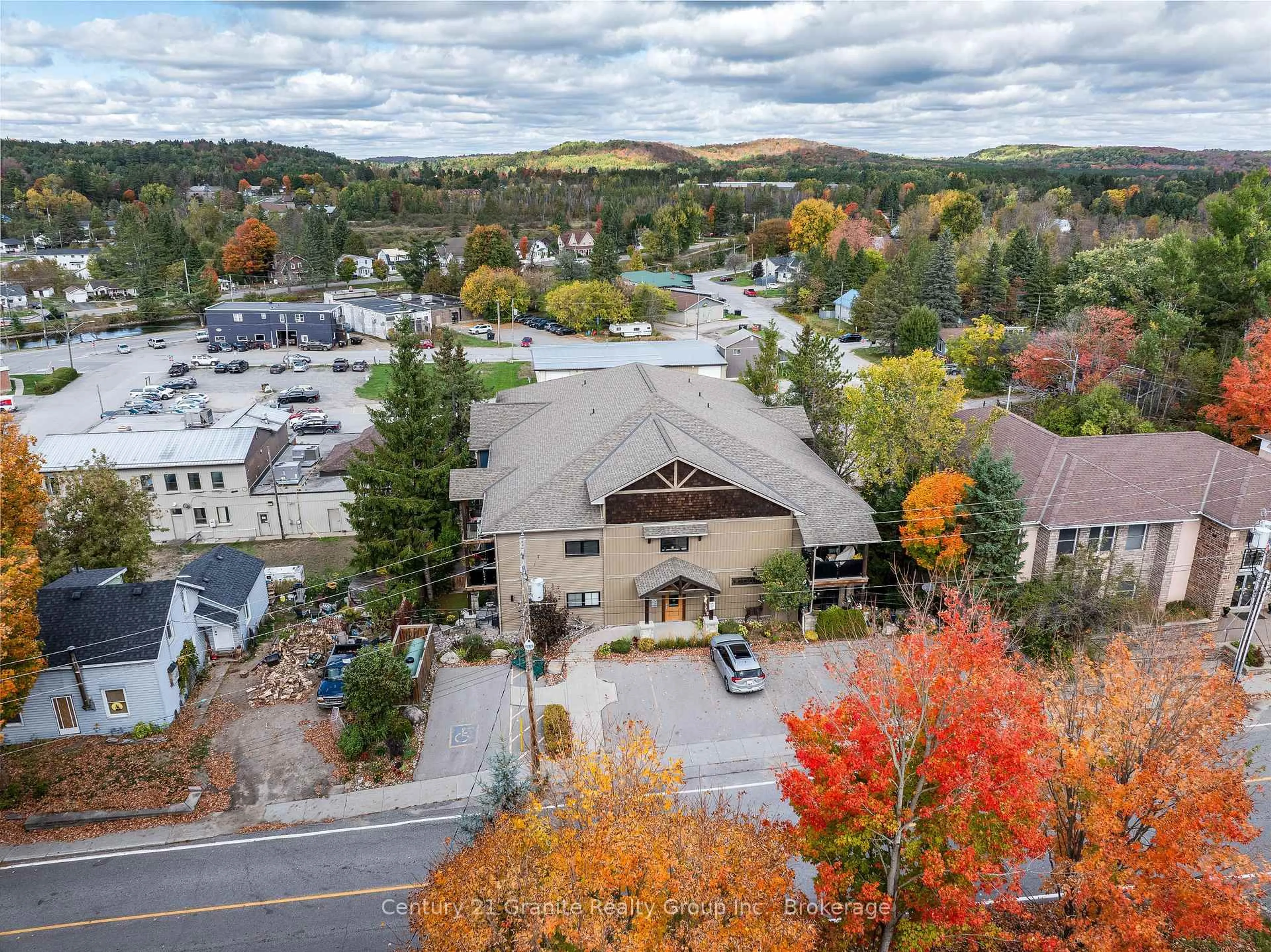 A pic from outside/outdoor area/front of a property/back of a property/a pic from drone, mountain view for 9 Newcastle St #101, Minden Hills Ontario K0M 2K0