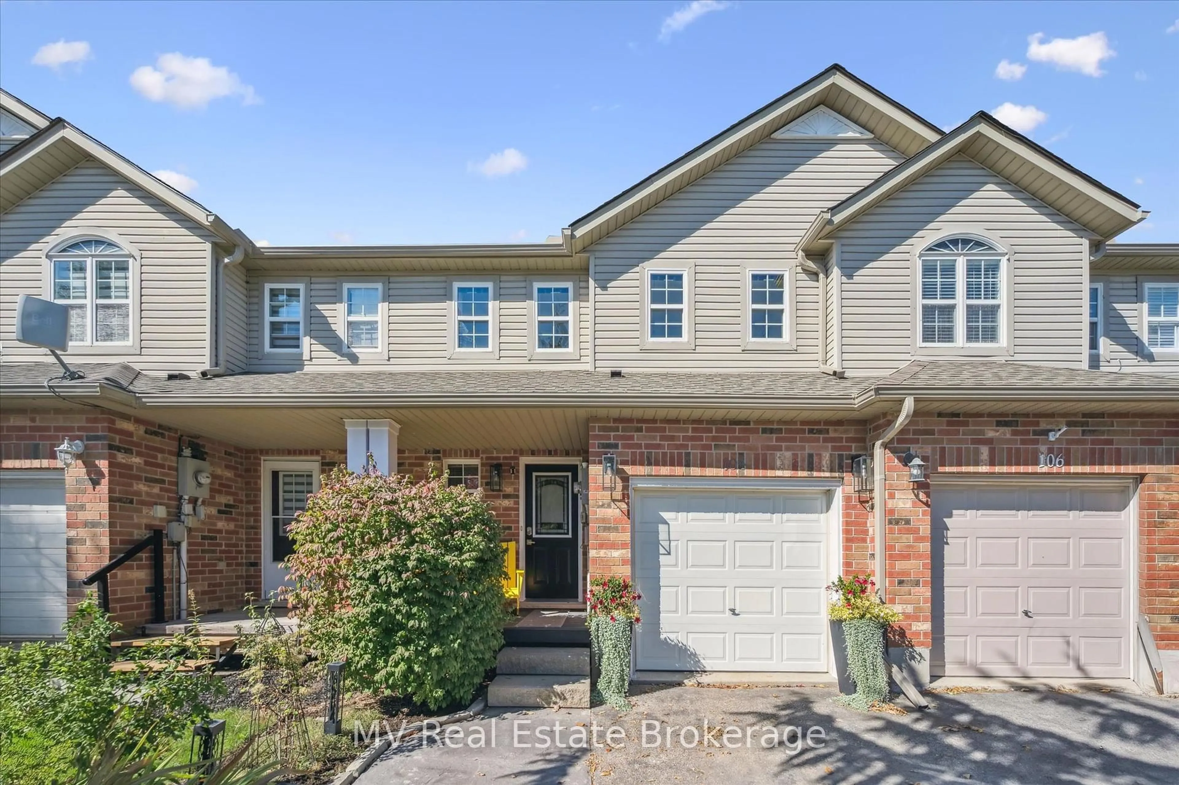 Home with brick exterior material, street for 104 Gibbons Dr, Centre Wellington Ontario N1M 3V8