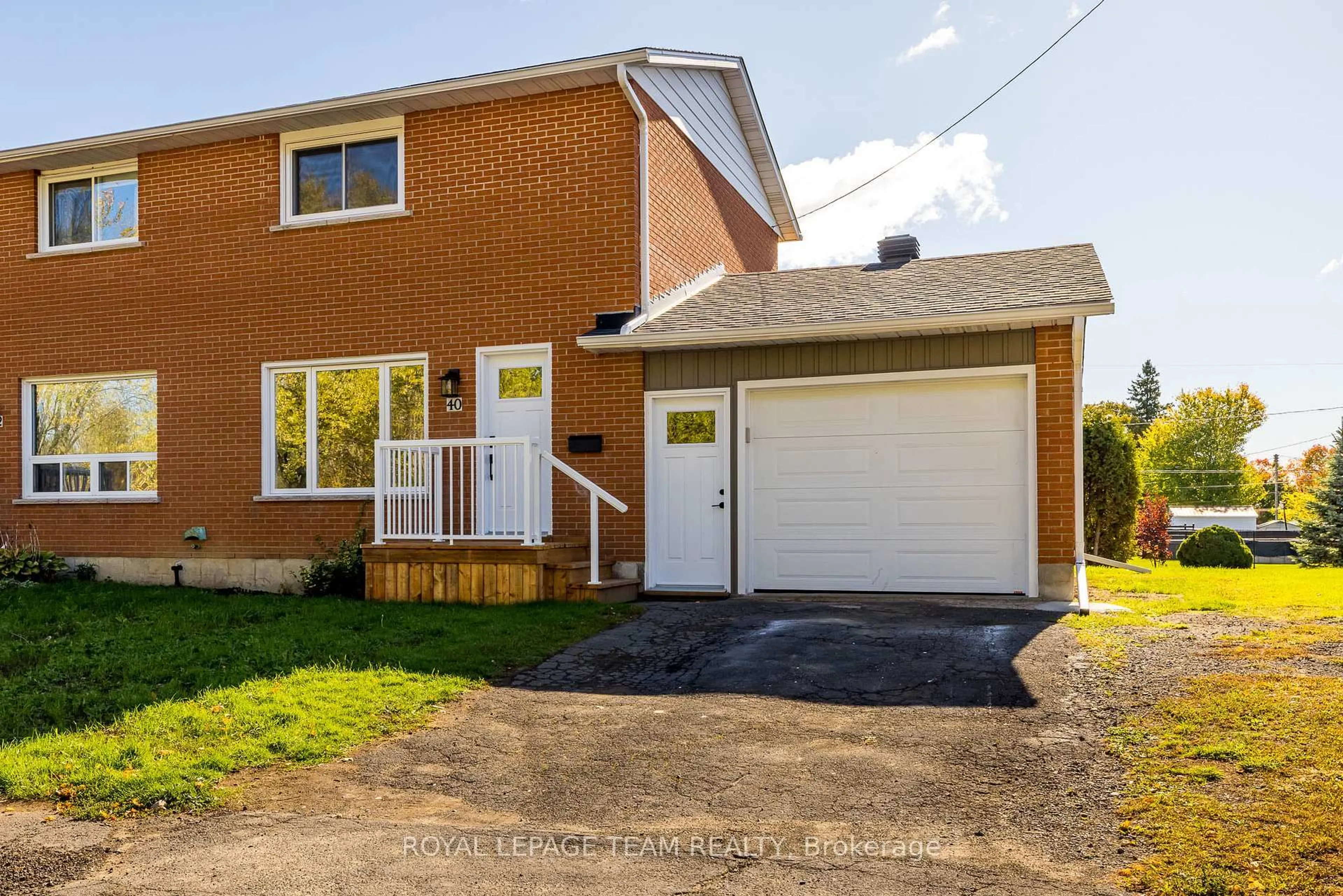 Home with brick exterior material, street for 40 Beach Ave, South Dundas Ontario K0E 1K0