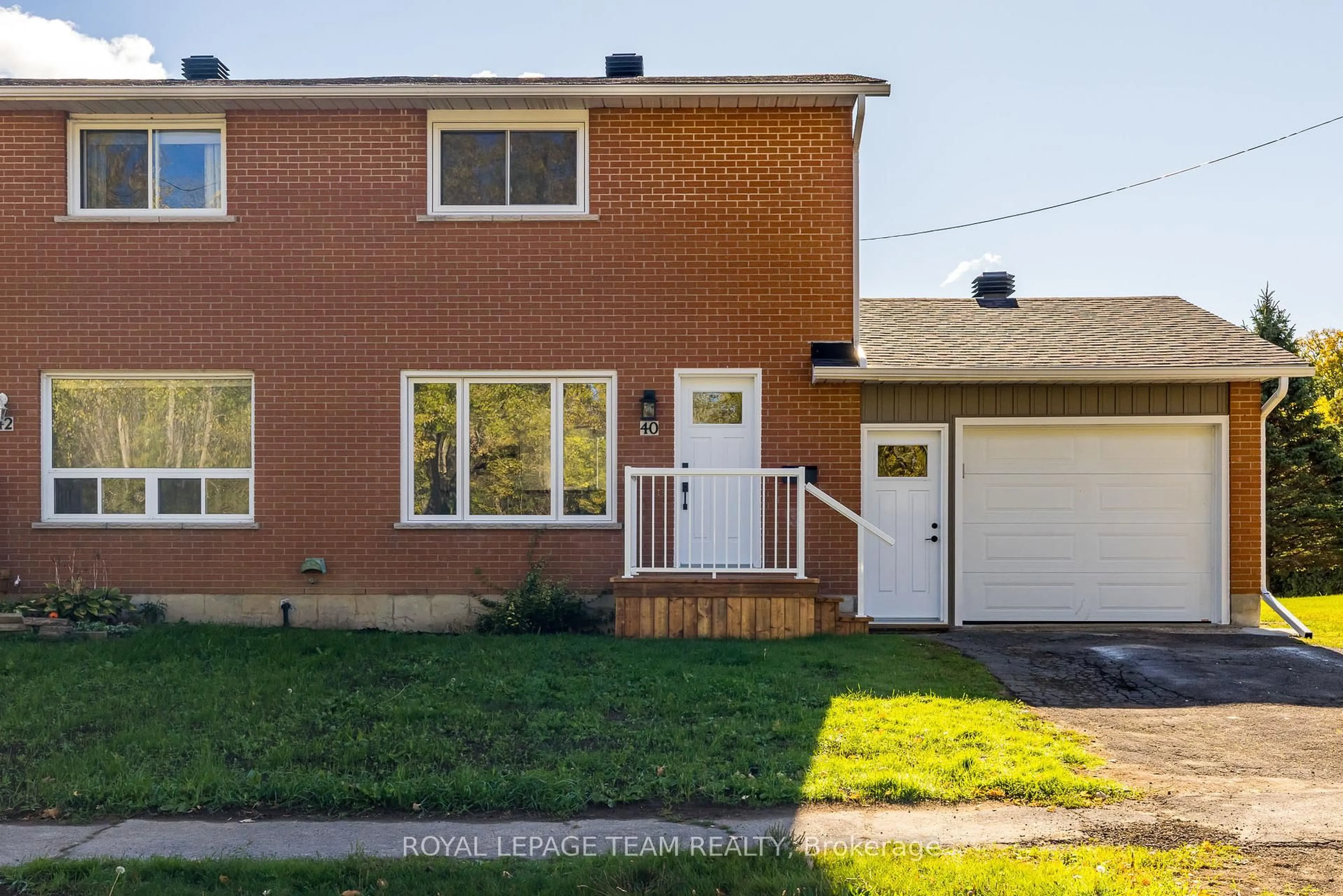 Home with brick exterior material, street for 40 Beach Ave, South Dundas Ontario K0E 1K0