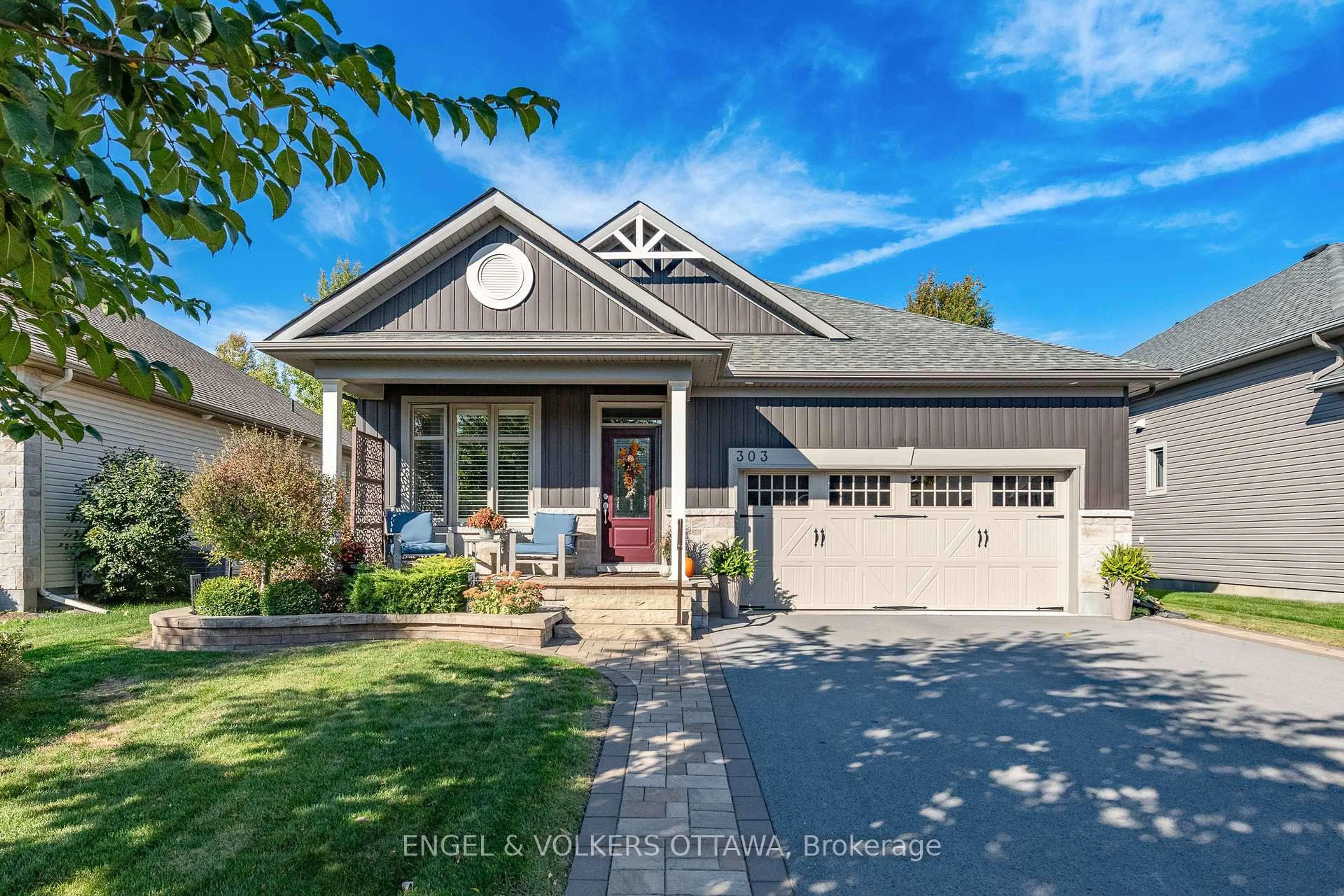 Home with vinyl exterior material, street for 303 Equinelle Dr, North Grenville Ontario K0G 1J0