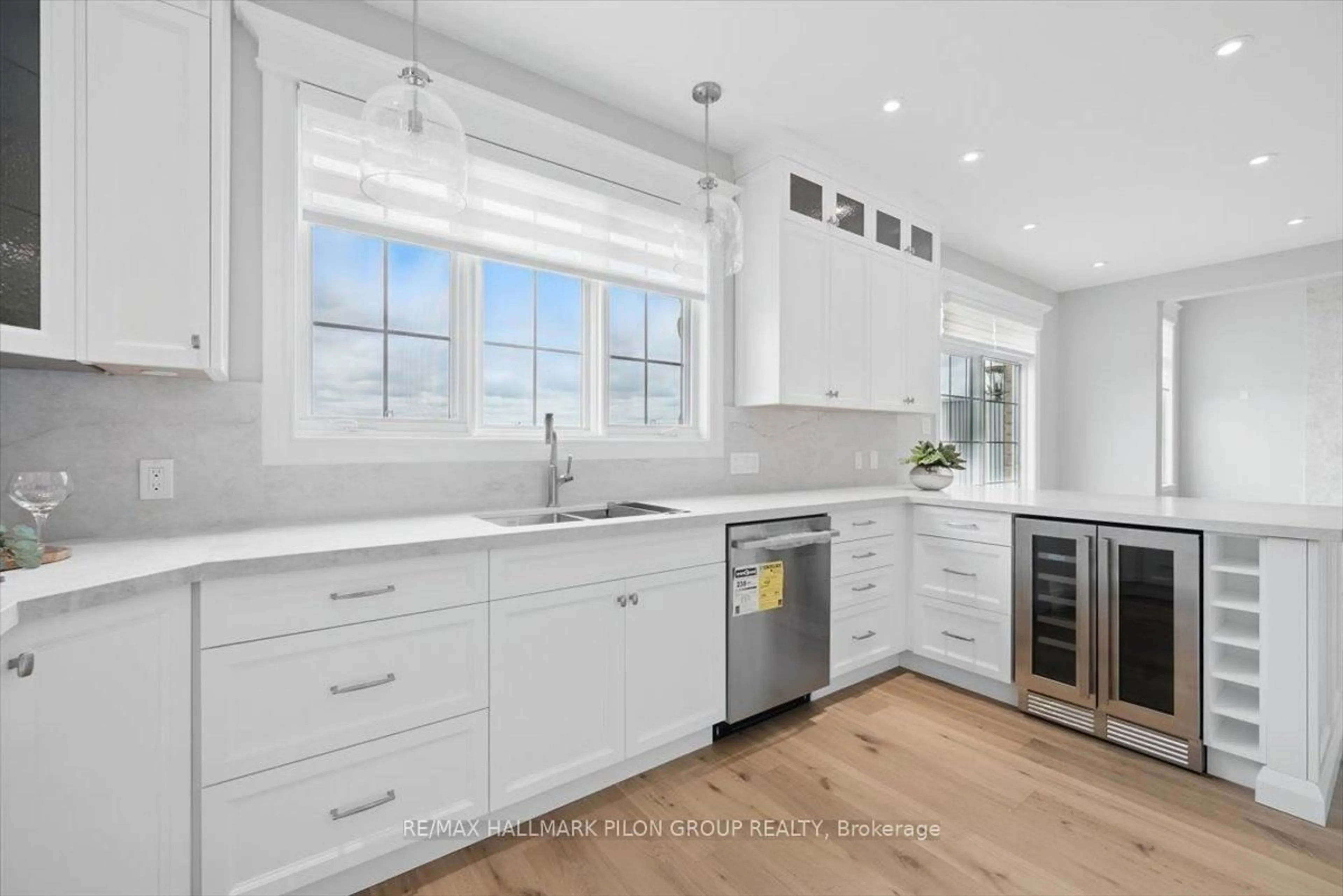 Open concept kitchen, ceramic/tile floor for 6373 RADISSON Way, Ottawa Ontario K1C 2Z9