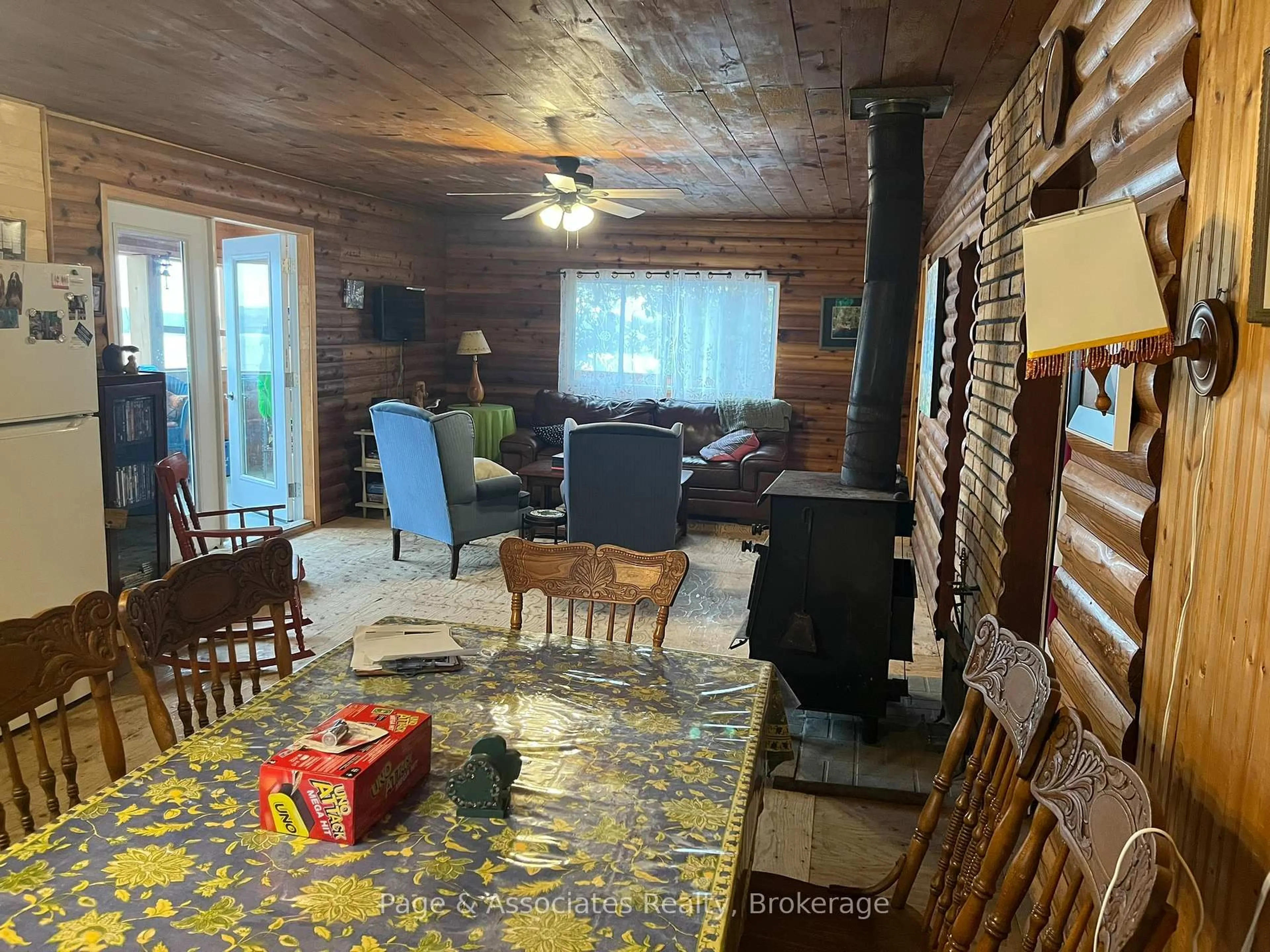 Living room with furniture, wood/laminate floor for 124A Northshore Rd, West Nipissing Ontario P0H 1M0