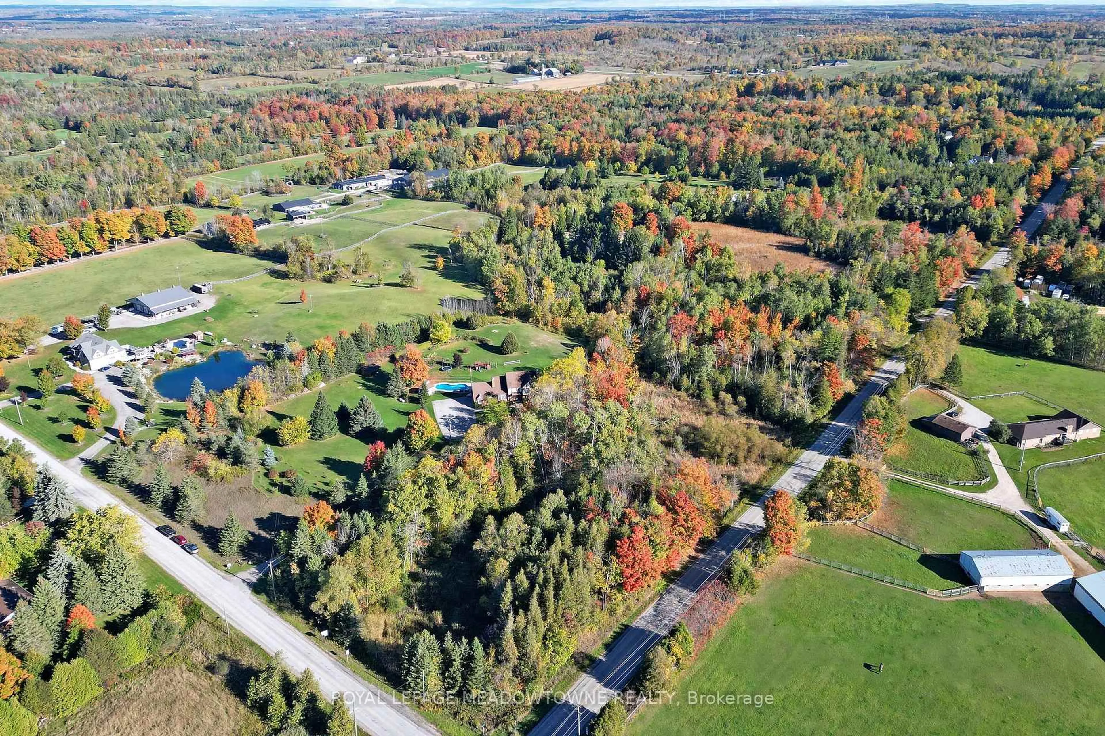A pic from outside/outdoor area/front of a property/back of a property/a pic from drone, forest/trees view for 4905 First Line, Erin Ontario L7J 2L9