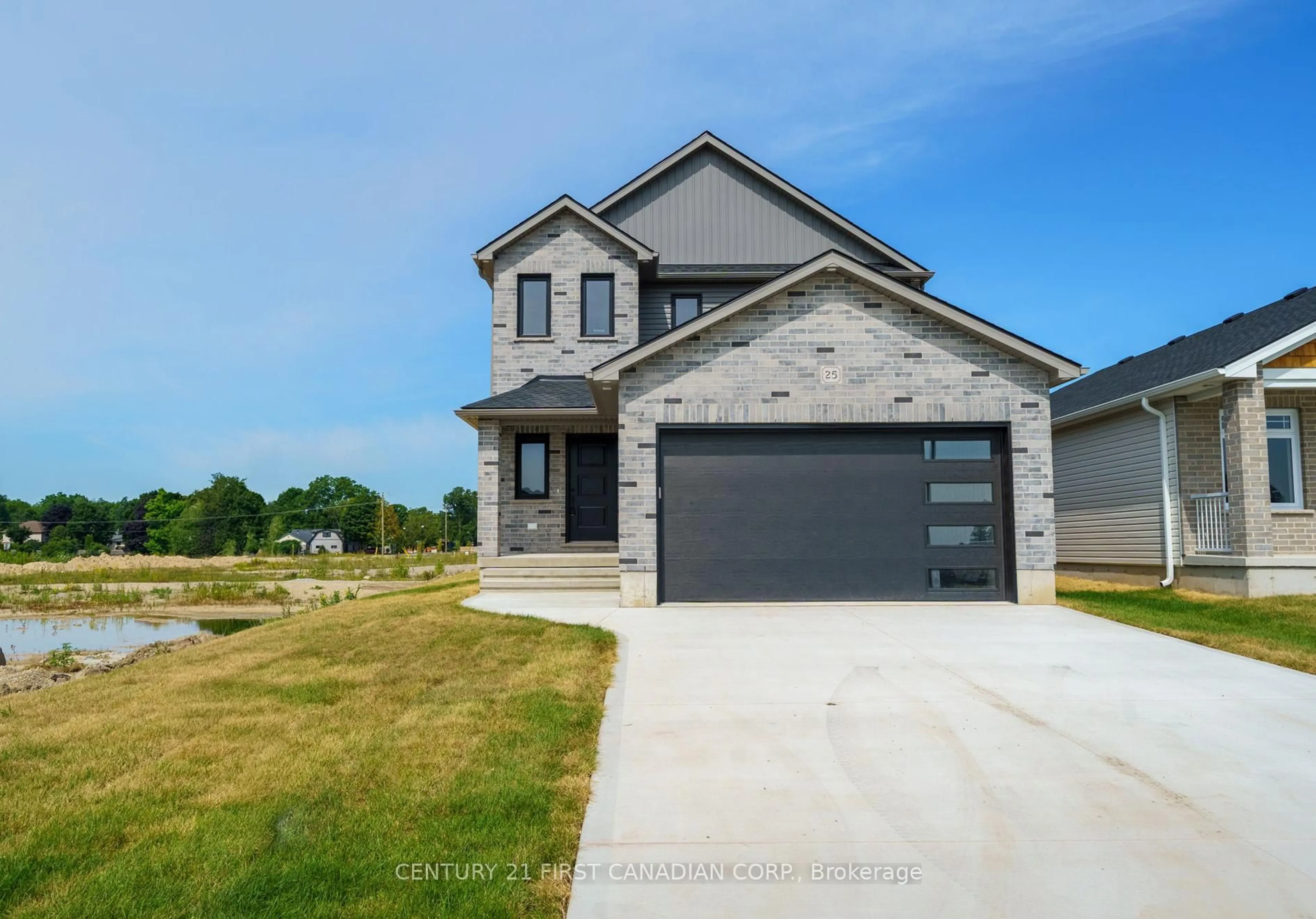 Home with brick exterior material, street for 25 Sheldabren St, North Middlesex Ontario N0M 1A0
