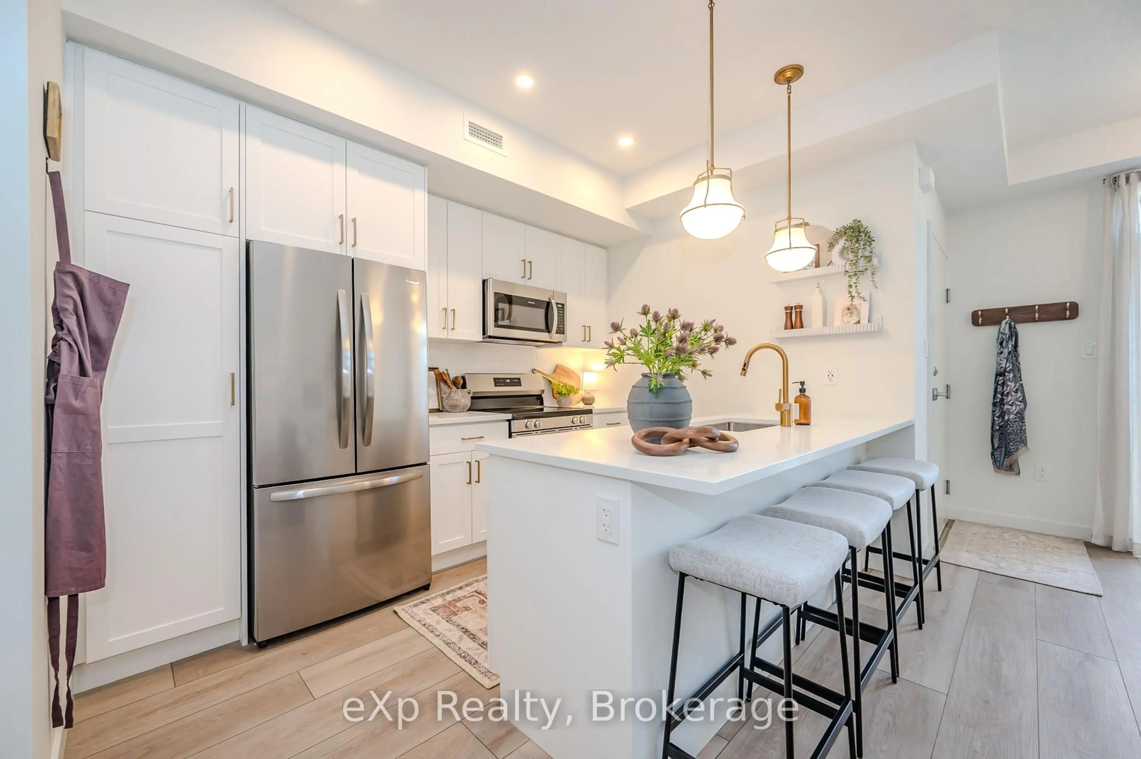 Open concept kitchen, ceramic/tile floor for 824 Woolwich St #105, Guelph Ontario N1H 0E1