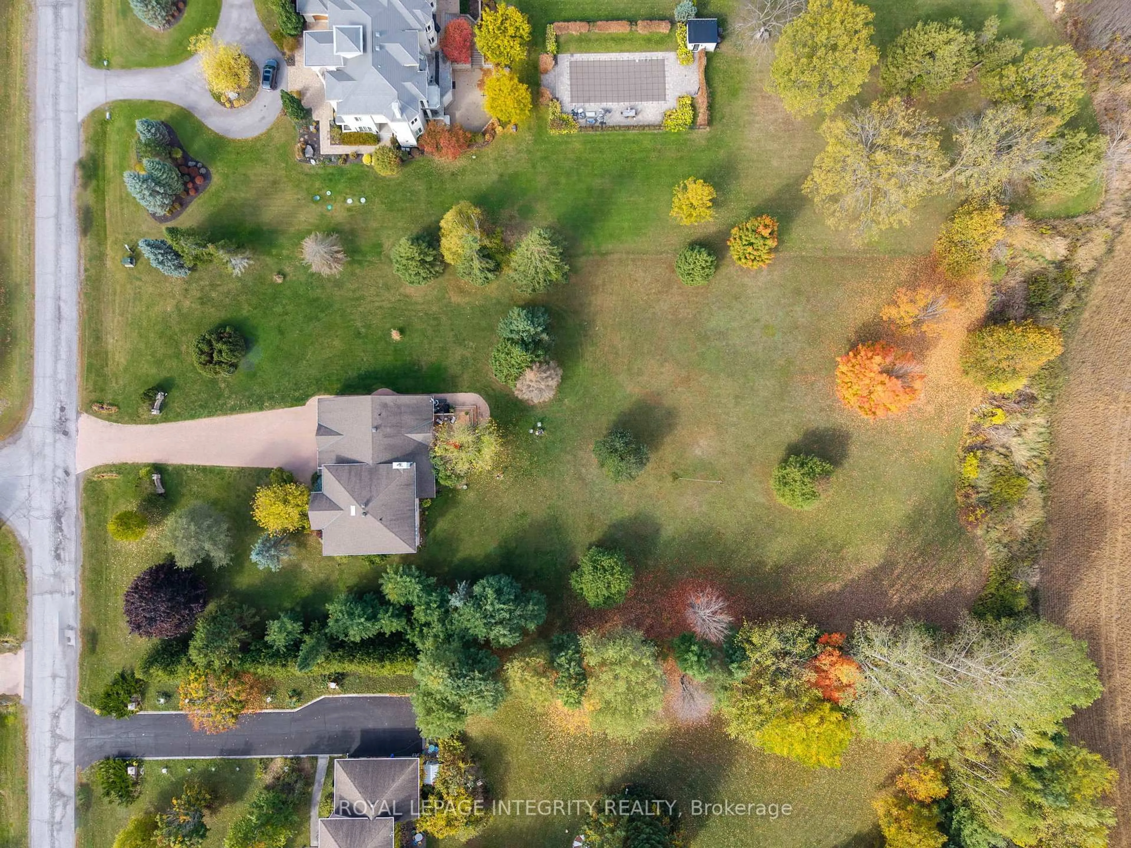 A pic from outside/outdoor area/front of a property/back of a property/a pic from drone, forest/trees view for 6 Marchbrook Circ, Ottawa Ontario K2W 1A1