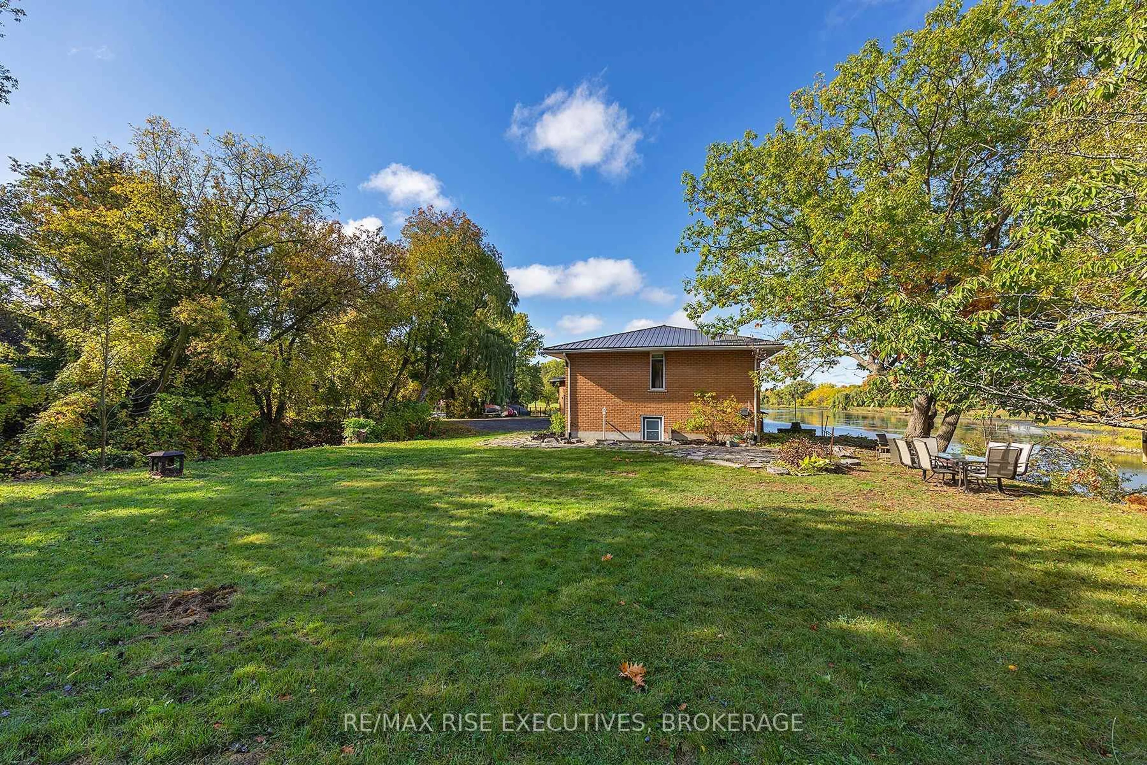 A pic from outside/outdoor area/front of a property/back of a property/a pic from drone, water/lake/river/ocean view for 71 River Rd, Greater Napanee Ontario K7P 3H7