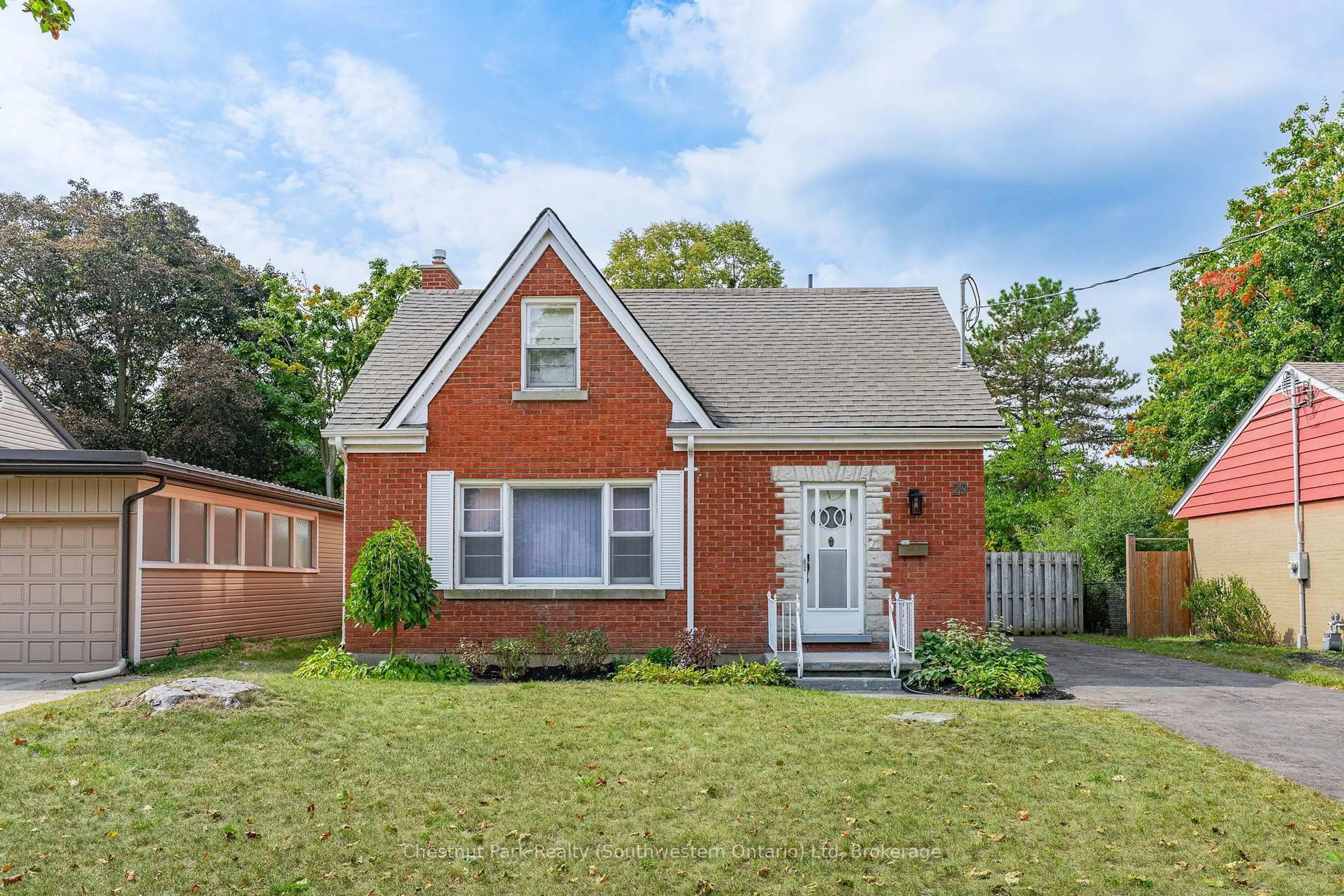 Home with brick exterior material, street for 29 Ridgewood Ave, Waterloo Ontario N2H 4L1