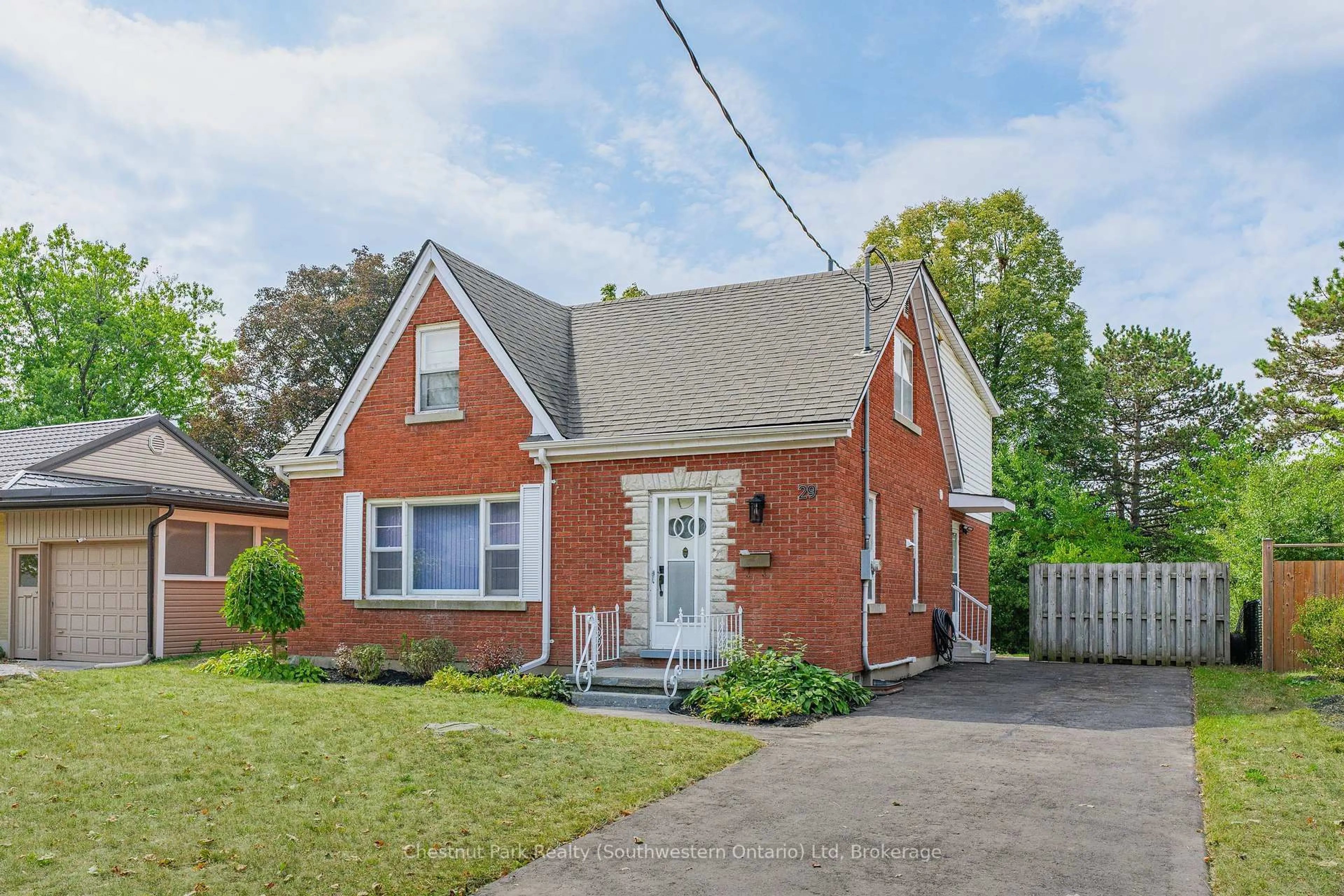 Home with brick exterior material, street for 29 Ridgewood Ave, Waterloo Ontario N2H 4L1