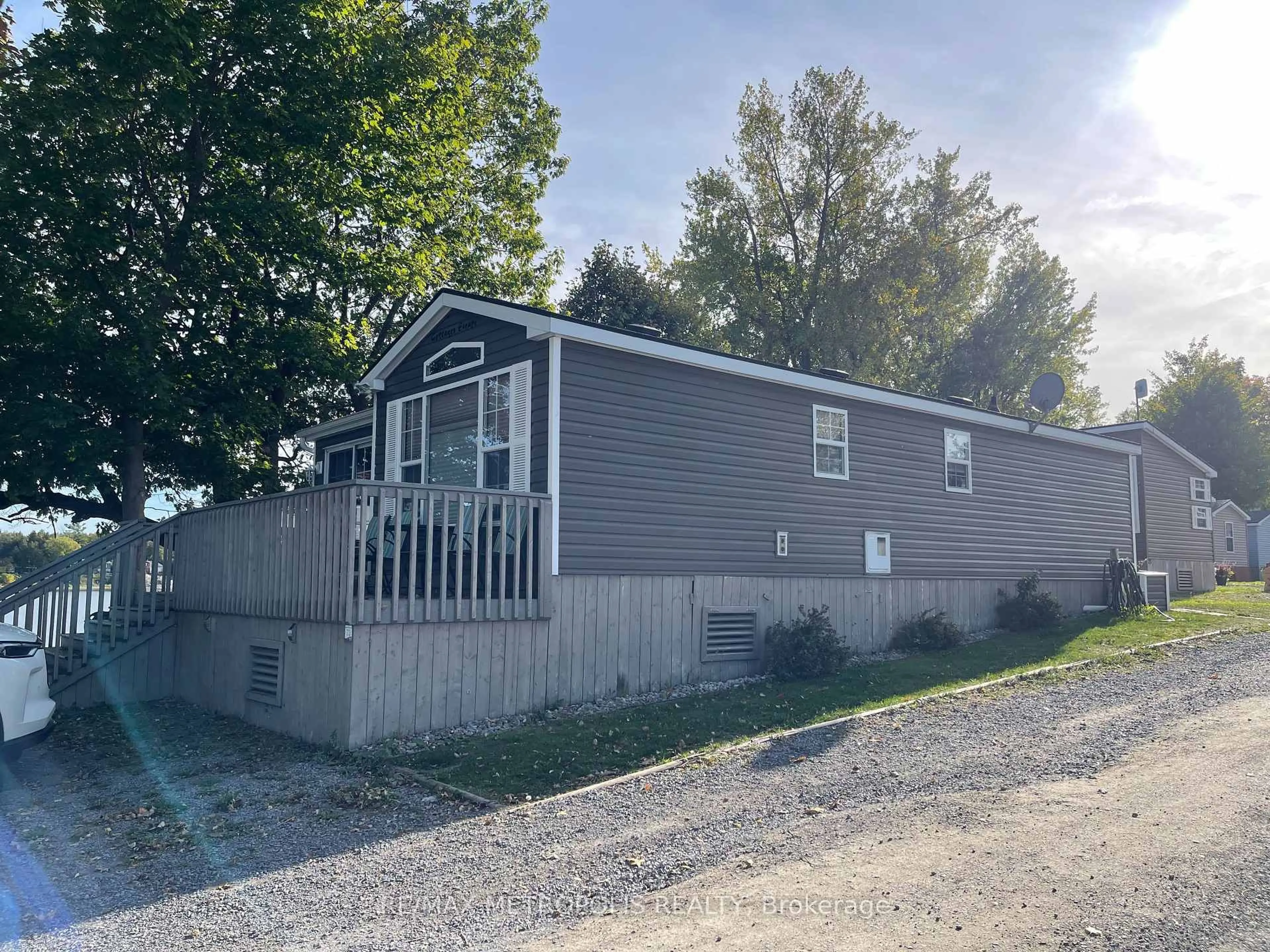 Home with vinyl exterior material, street for 486 Cty Cherry Beach Lane #18-73, Prince Edward County Ontario K0K 2P0
