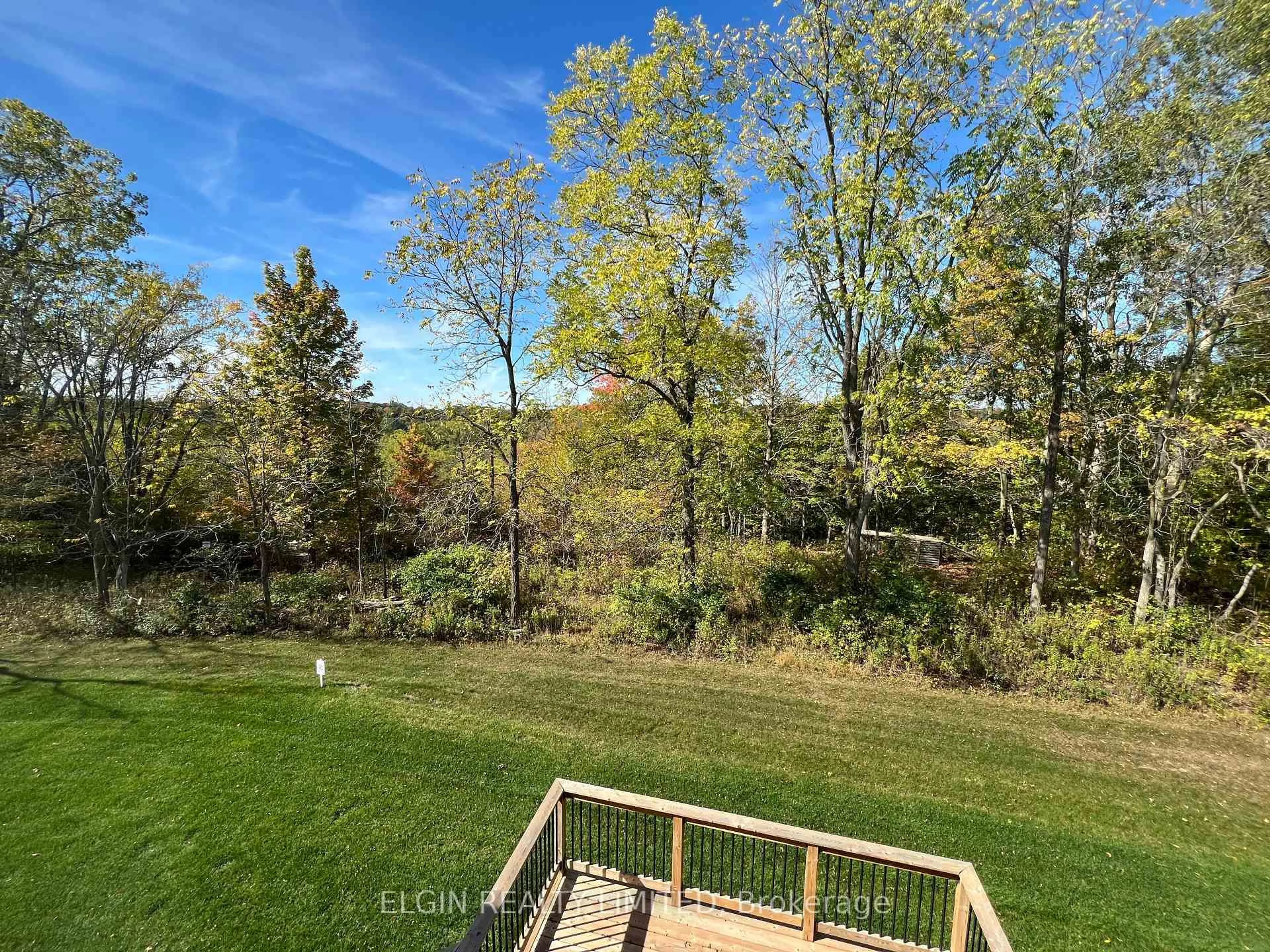 A pic from outside/outdoor area/front of a property/back of a property/a pic from drone, forest/trees view for 11-49 Royal Dornoch Dr, St. Thomas Ontario N5R 0P4