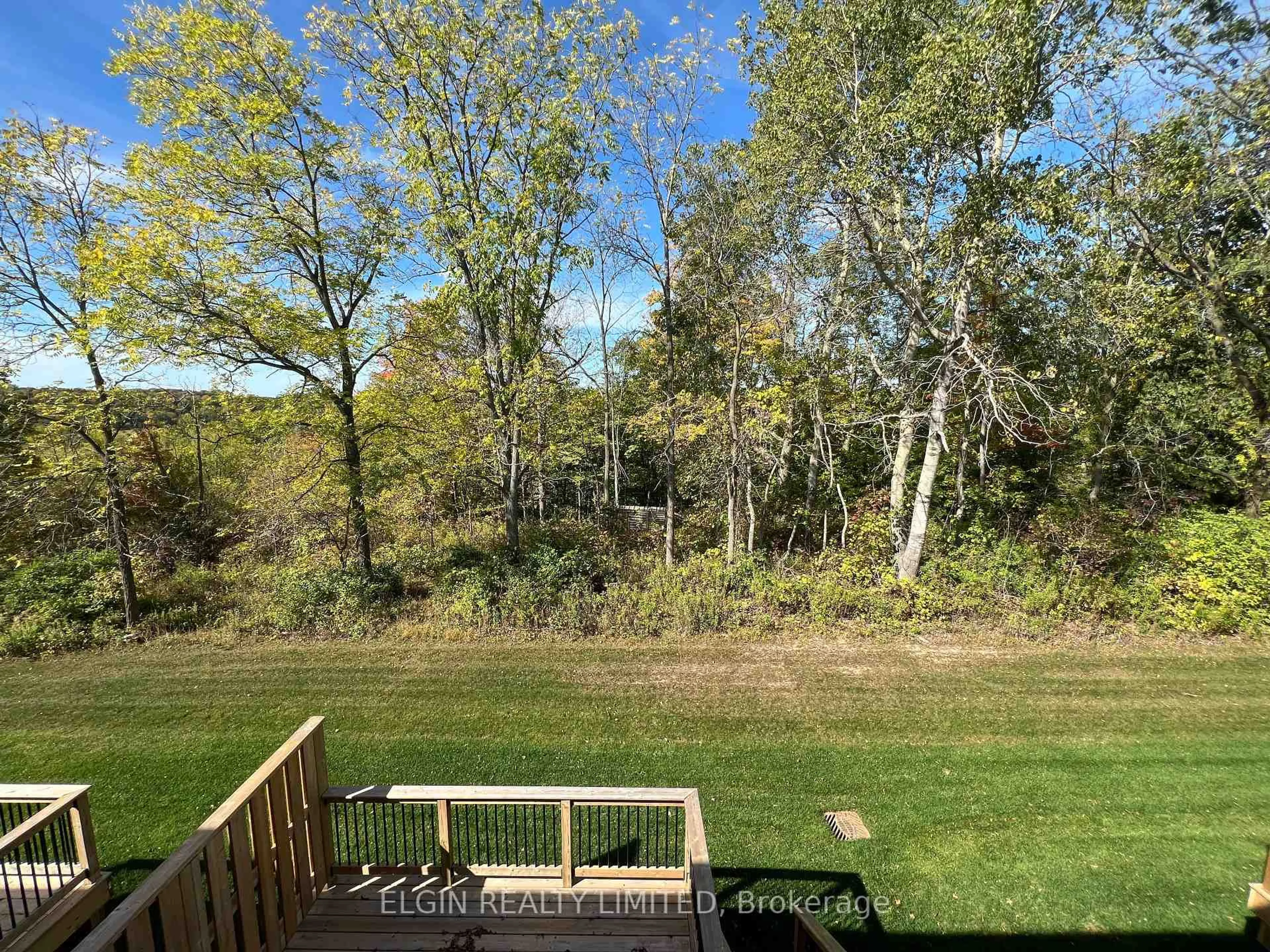 A pic from outside/outdoor area/front of a property/back of a property/a pic from drone, forest/trees view for 9-49 Royal Dornoch Dr, St. Thomas Ontario N5R 0P4