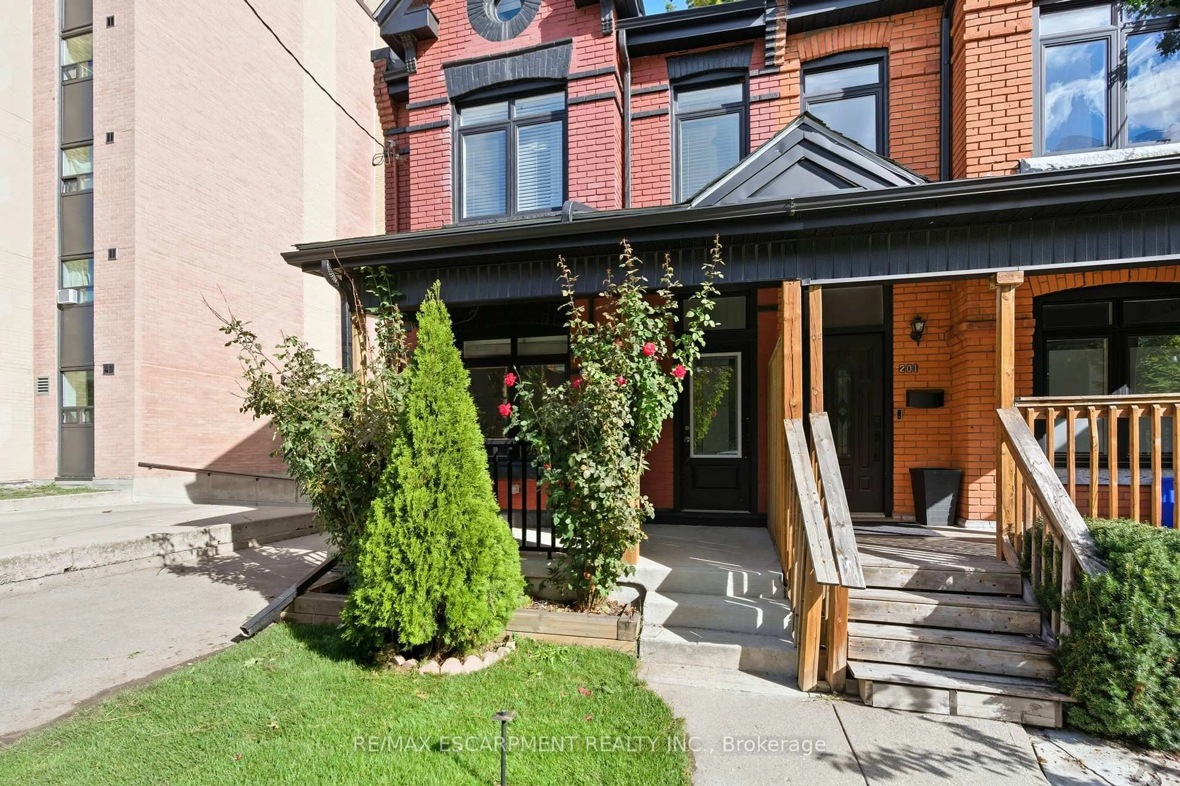 Home with brick exterior material, street for 199 Jackson St, Hamilton Ontario L8N 1L7