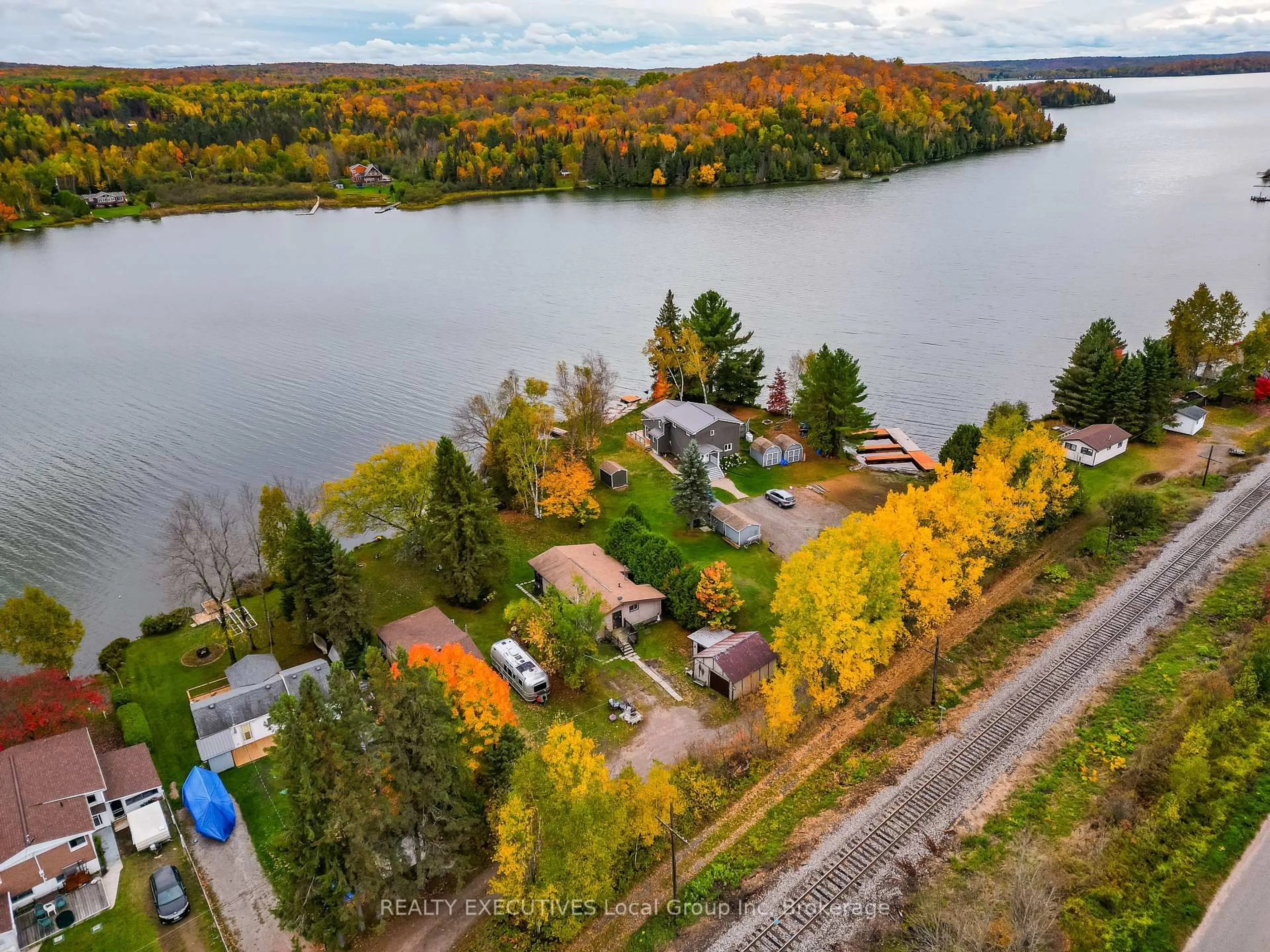 A pic from outside/outdoor area/front of a property/back of a property/a pic from drone, water/lake/river/ocean view for 306 Martindale Lane, Bonfield Ontario P0H 1E0