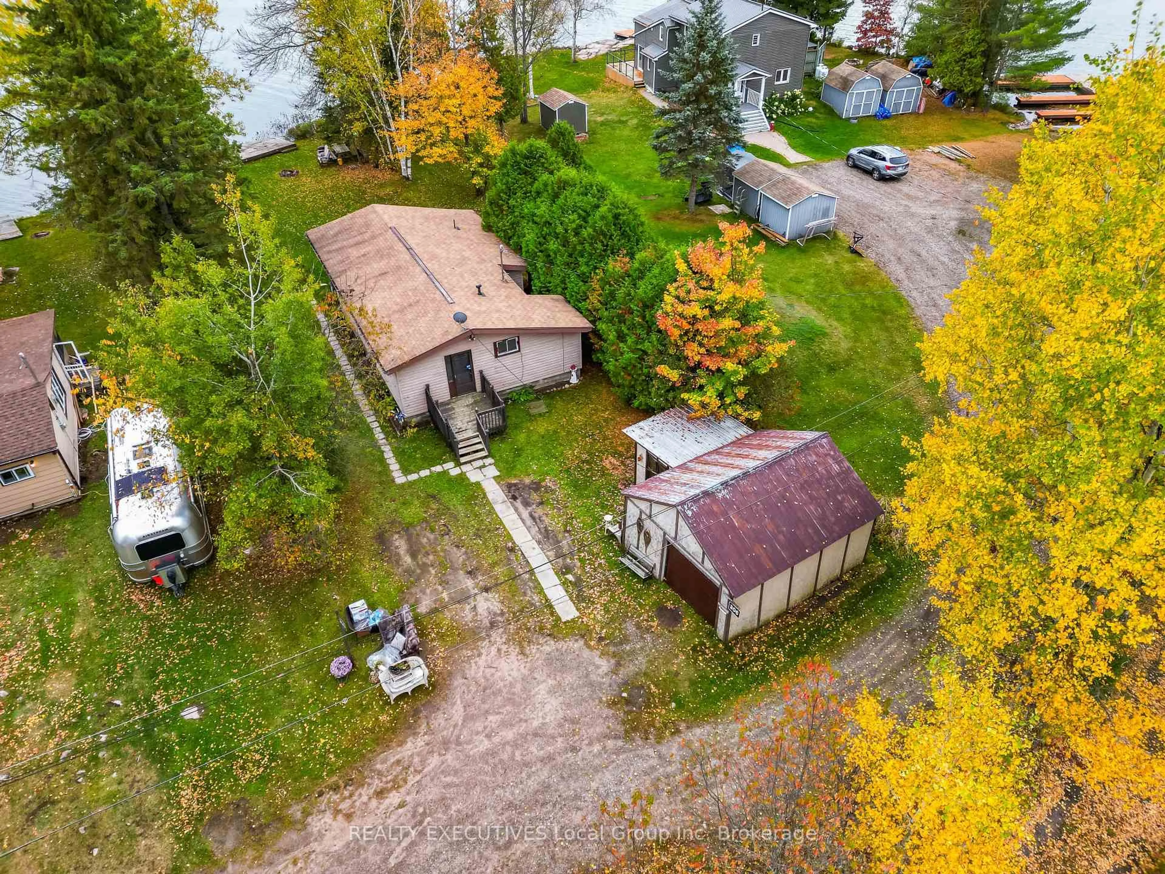 A pic from outside/outdoor area/front of a property/back of a property/a pic from drone, street for 306 Martindale Lane, Bonfield Ontario P0H 1E0