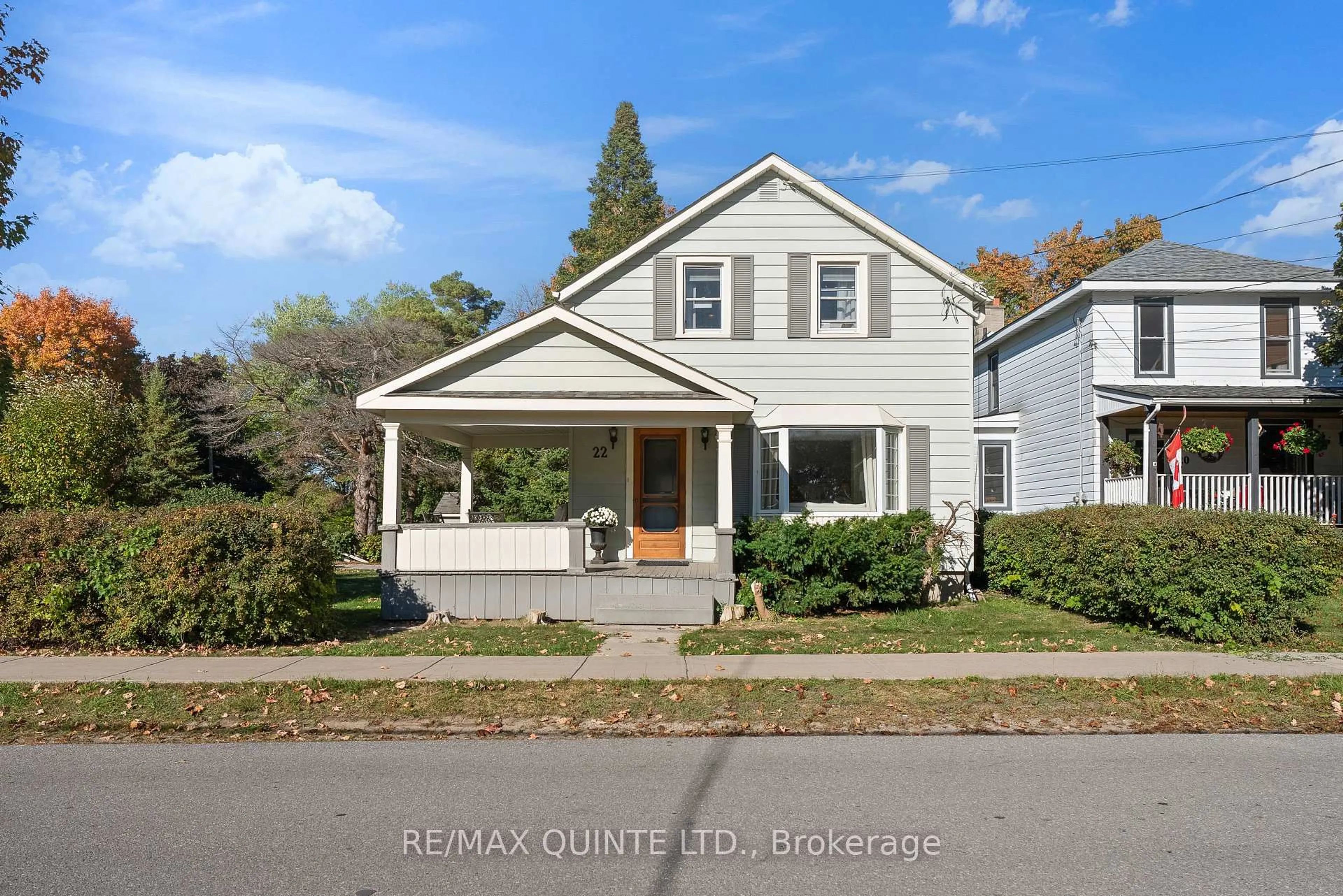 Home with vinyl exterior material, street for 22 Maple Ave, Prince Edward County Ontario K0K 2T0