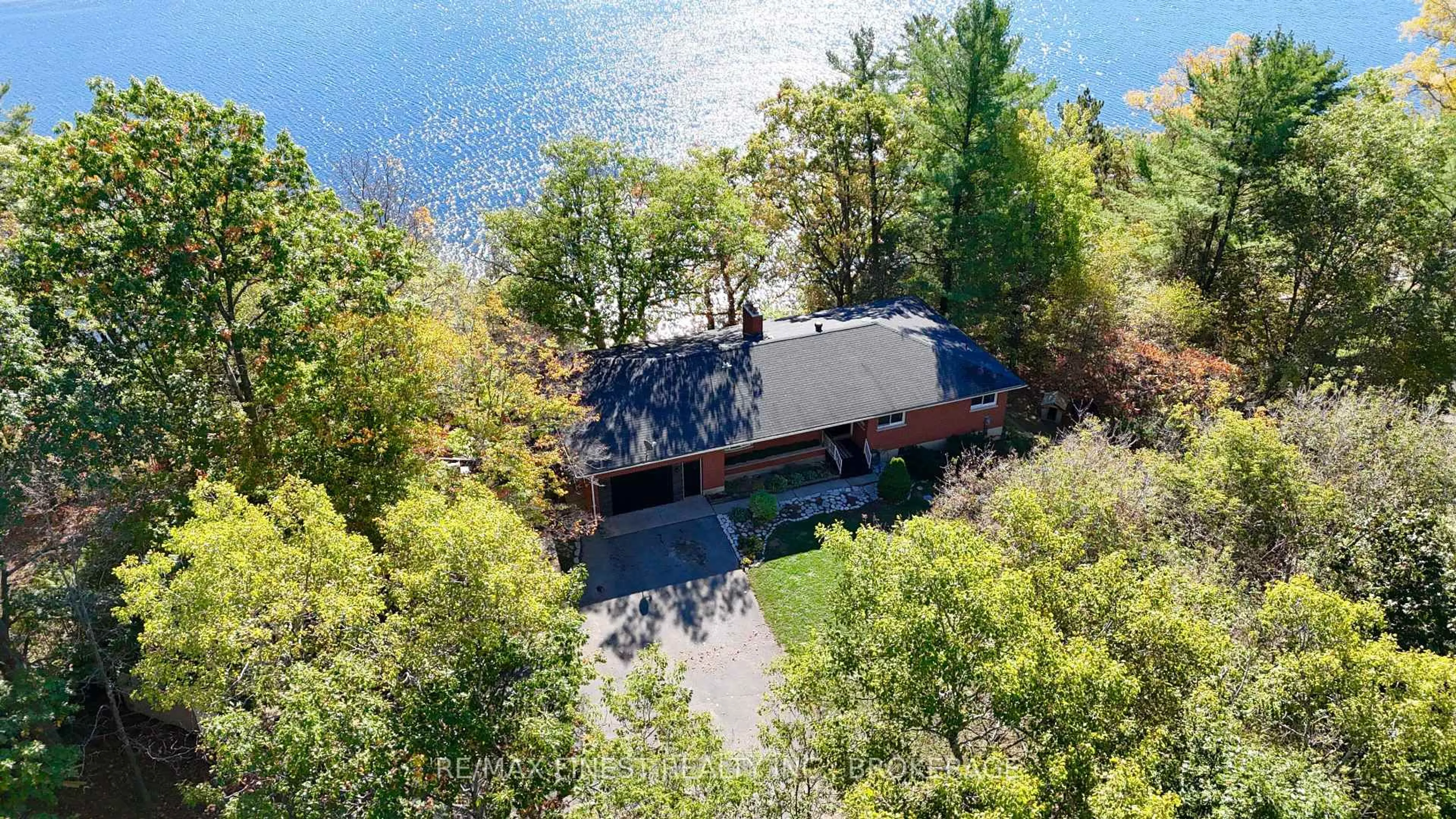 A pic from outside/outdoor area/front of a property/back of a property/a pic from drone, water/lake/river/ocean view for 4236 Pine Ridge Dr, Verona Ontario K0H 2W0