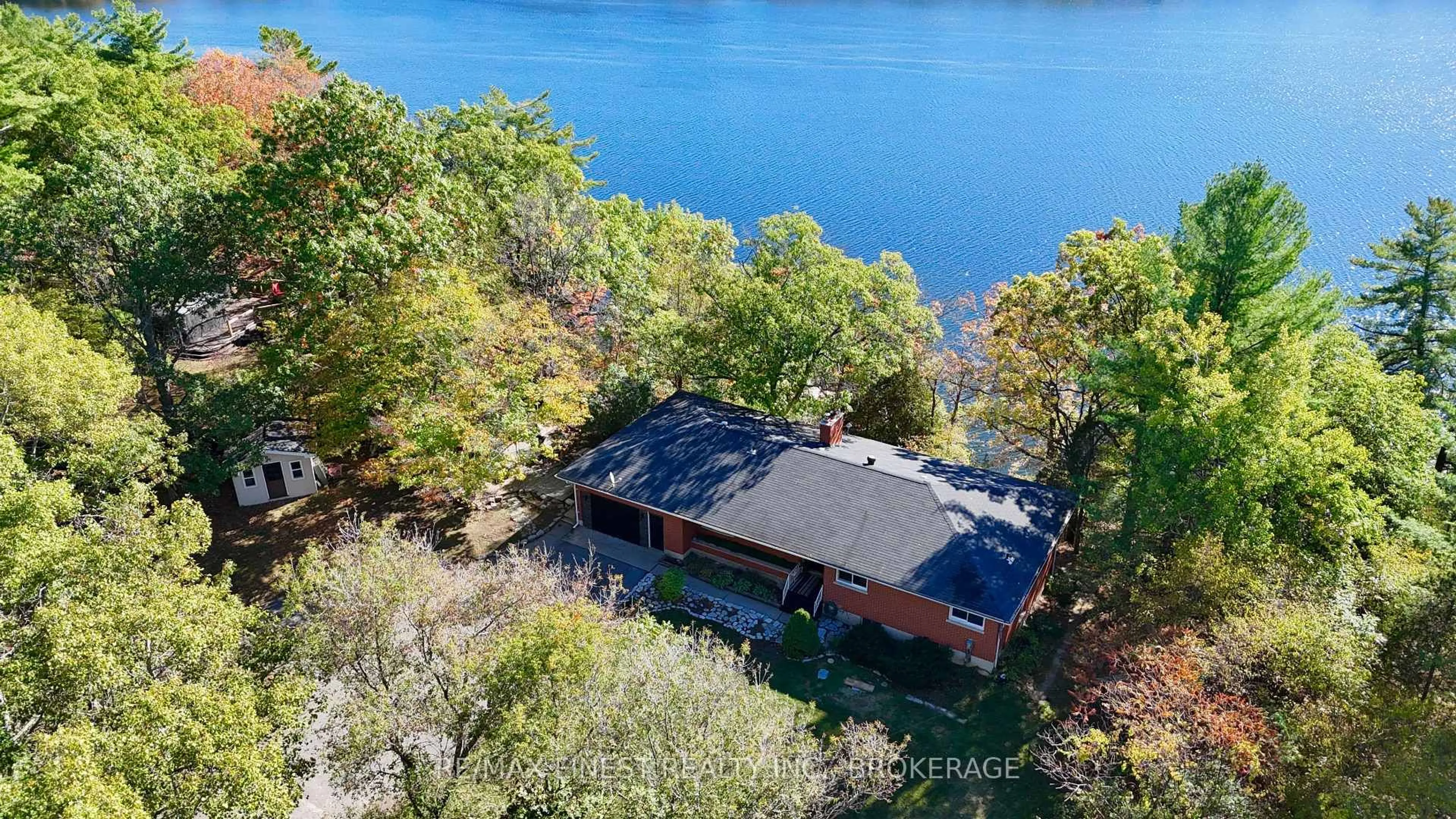 A pic from outside/outdoor area/front of a property/back of a property/a pic from drone, water/lake/river/ocean view for 4236 Pine Ridge Dr, Verona Ontario K0H 2W0