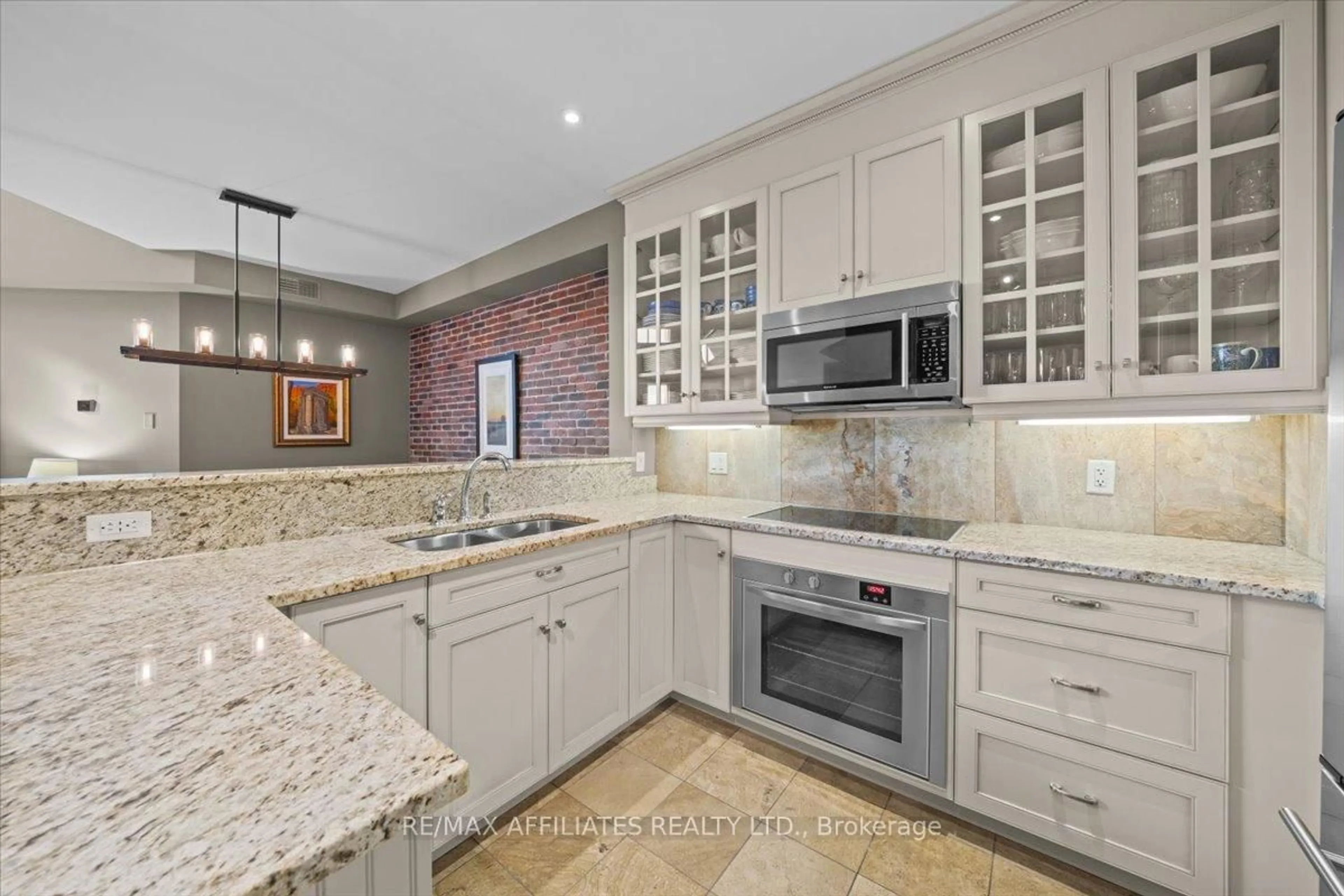Open concept kitchen, ceramic/tile floor for 320 Mcleod St ##PH804, Ottawa Ontario K2P 1A3