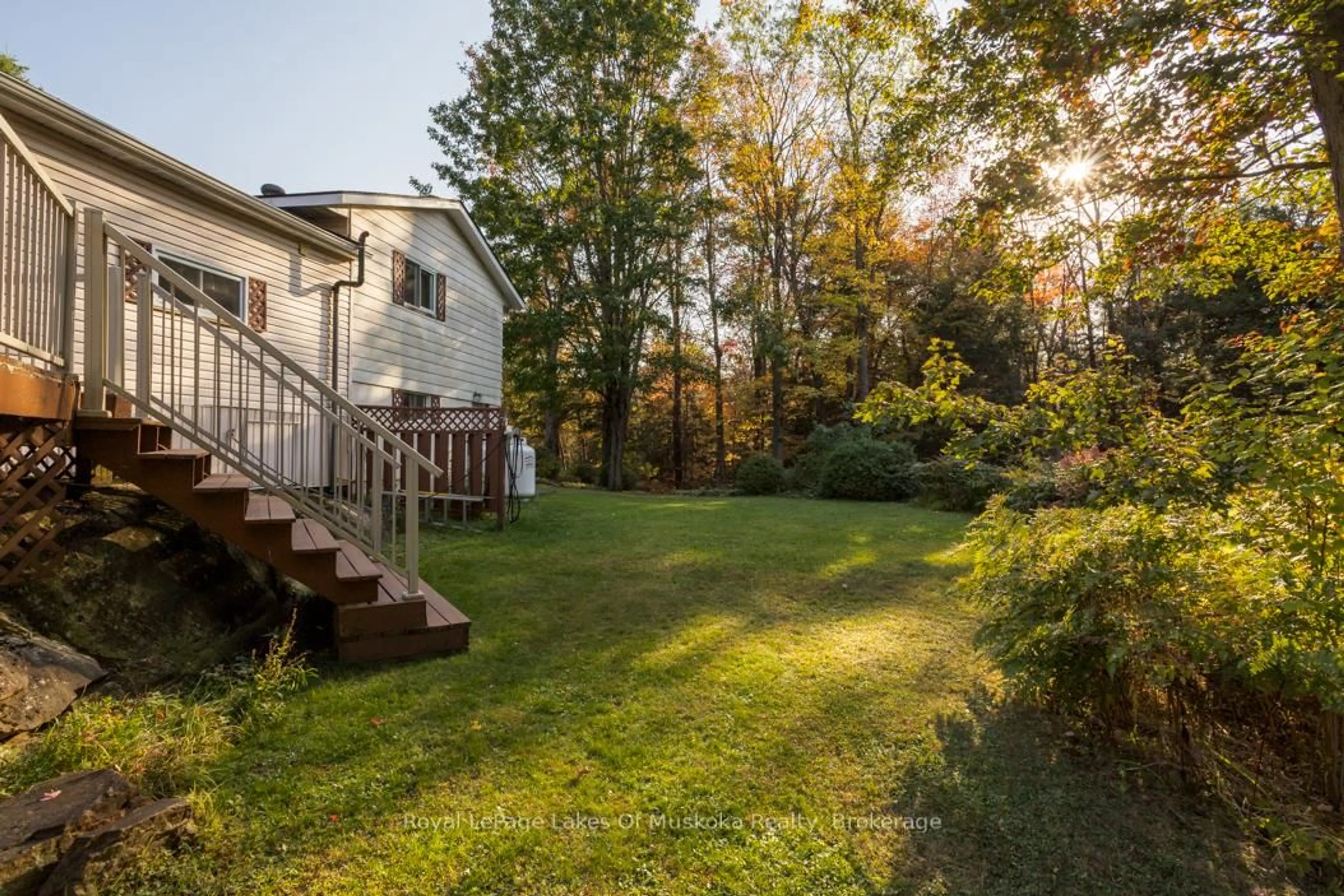 Patio, forest/trees view for 1397 Fraserburg Rd, Bracebridge Ontario P1L 0A1