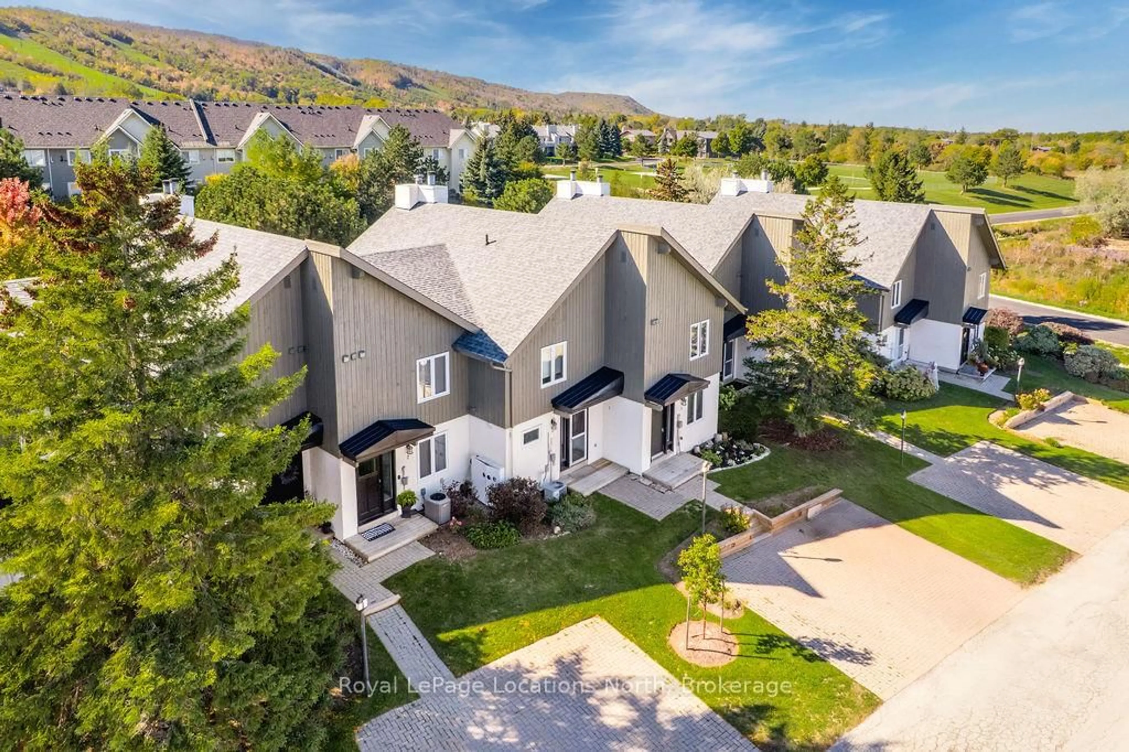 A pic from outside/outdoor area/front of a property/back of a property/a pic from drone, mountain view for 104 Kellies Way #7, Blue Mountains Ontario L9Y 0L5