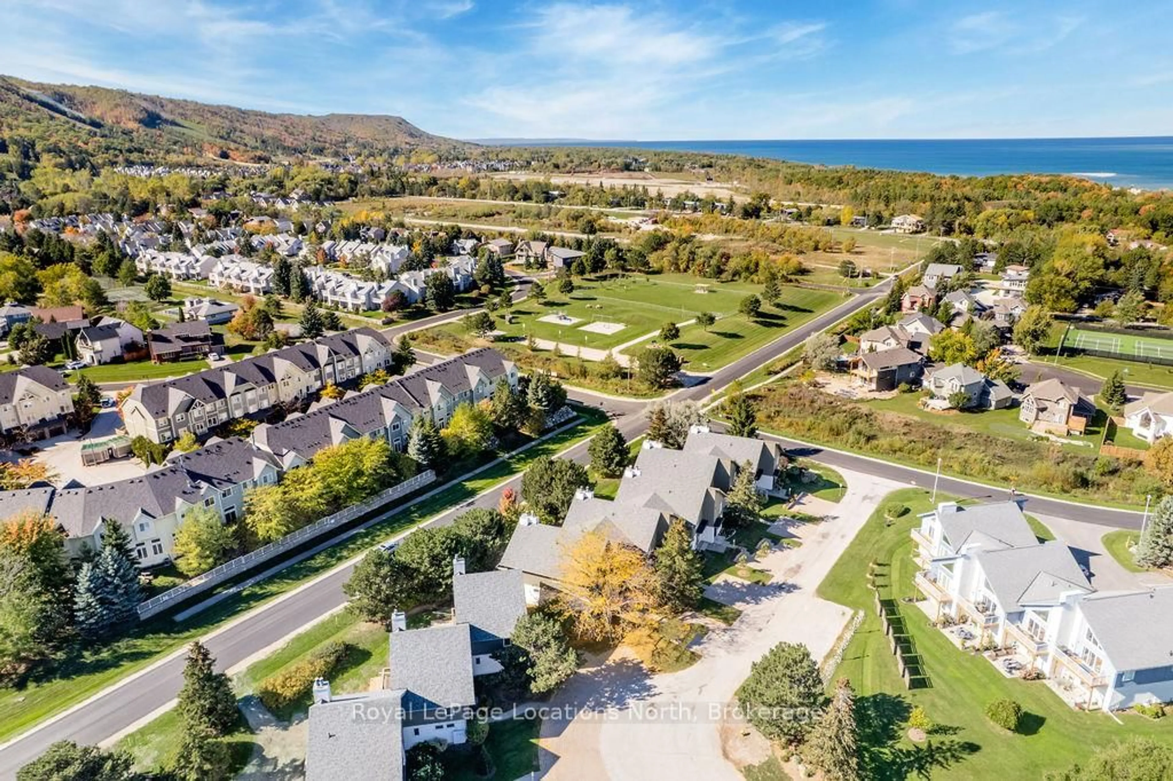 A pic from outside/outdoor area/front of a property/back of a property/a pic from drone, water/lake/river/ocean view for 104 Kellies Way #7, Blue Mountains Ontario L9Y 0L5