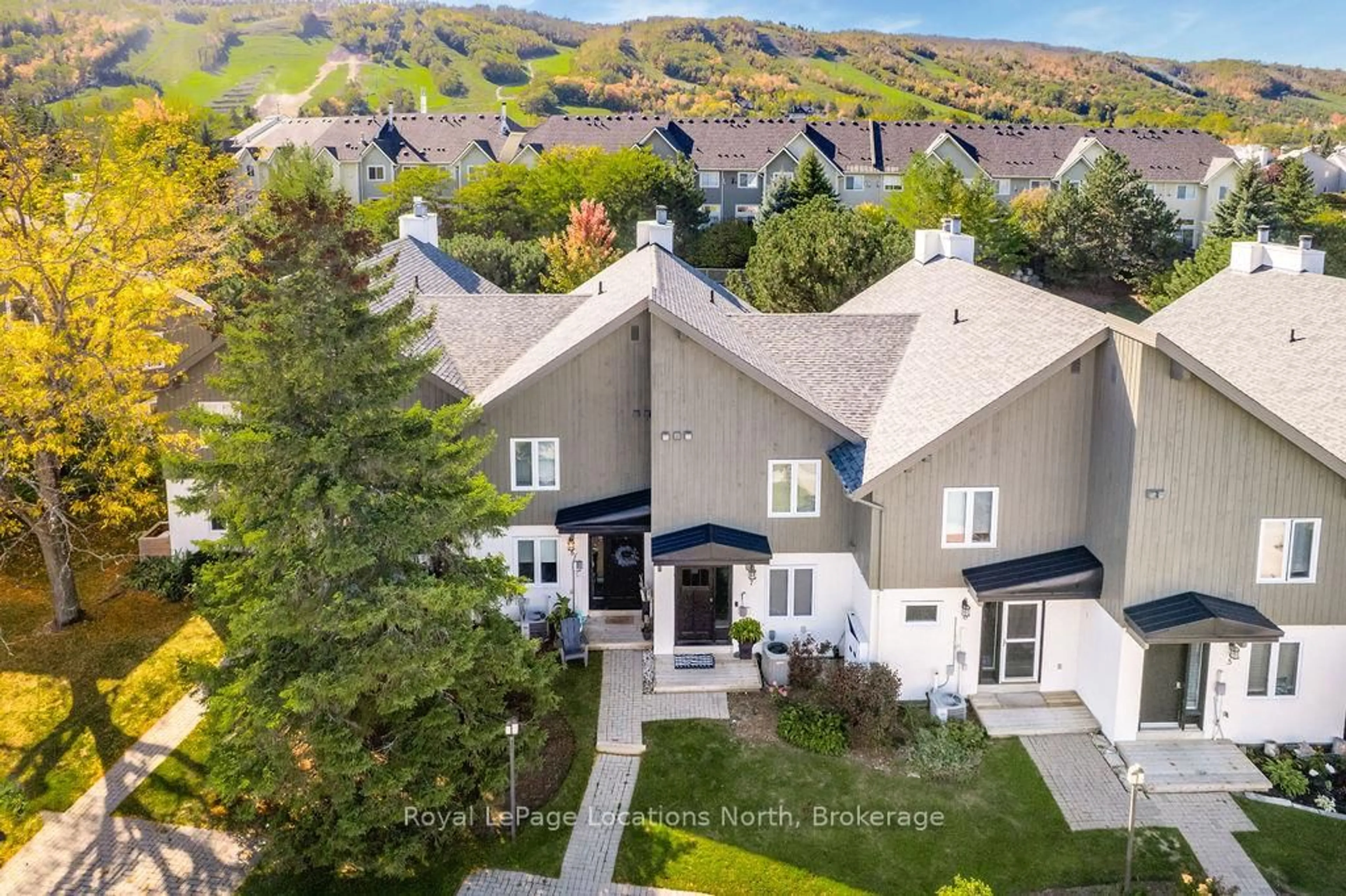 A pic from outside/outdoor area/front of a property/back of a property/a pic from drone, mountain view for 104 Kellies Way #7, Blue Mountains Ontario L9Y 0L5