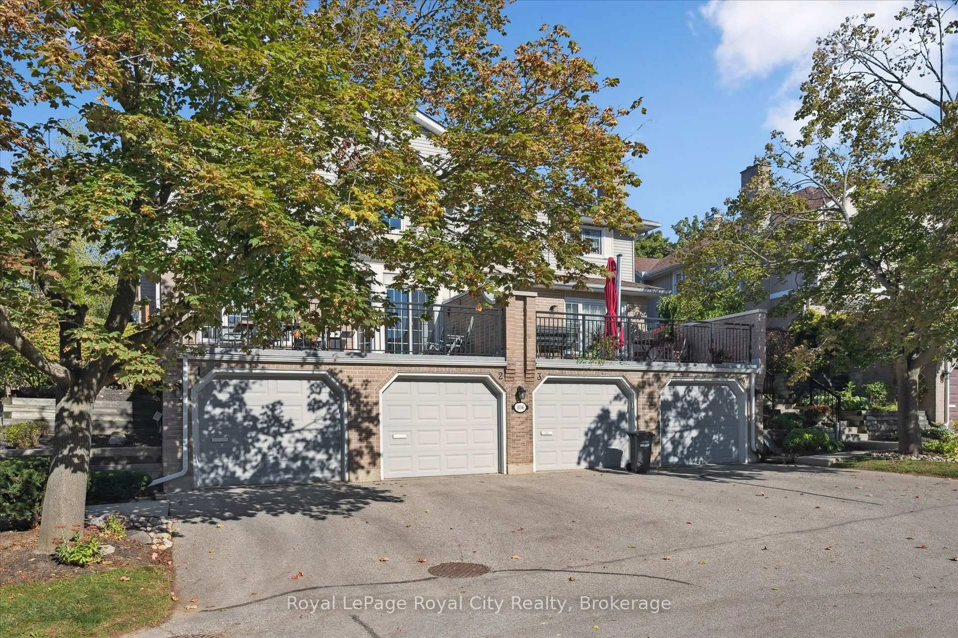 A pic from outside/outdoor area/front of a property/back of a property/a pic from drone, street for 104 Woodlawn Rd #3, Guelph Ontario N1E 1B7