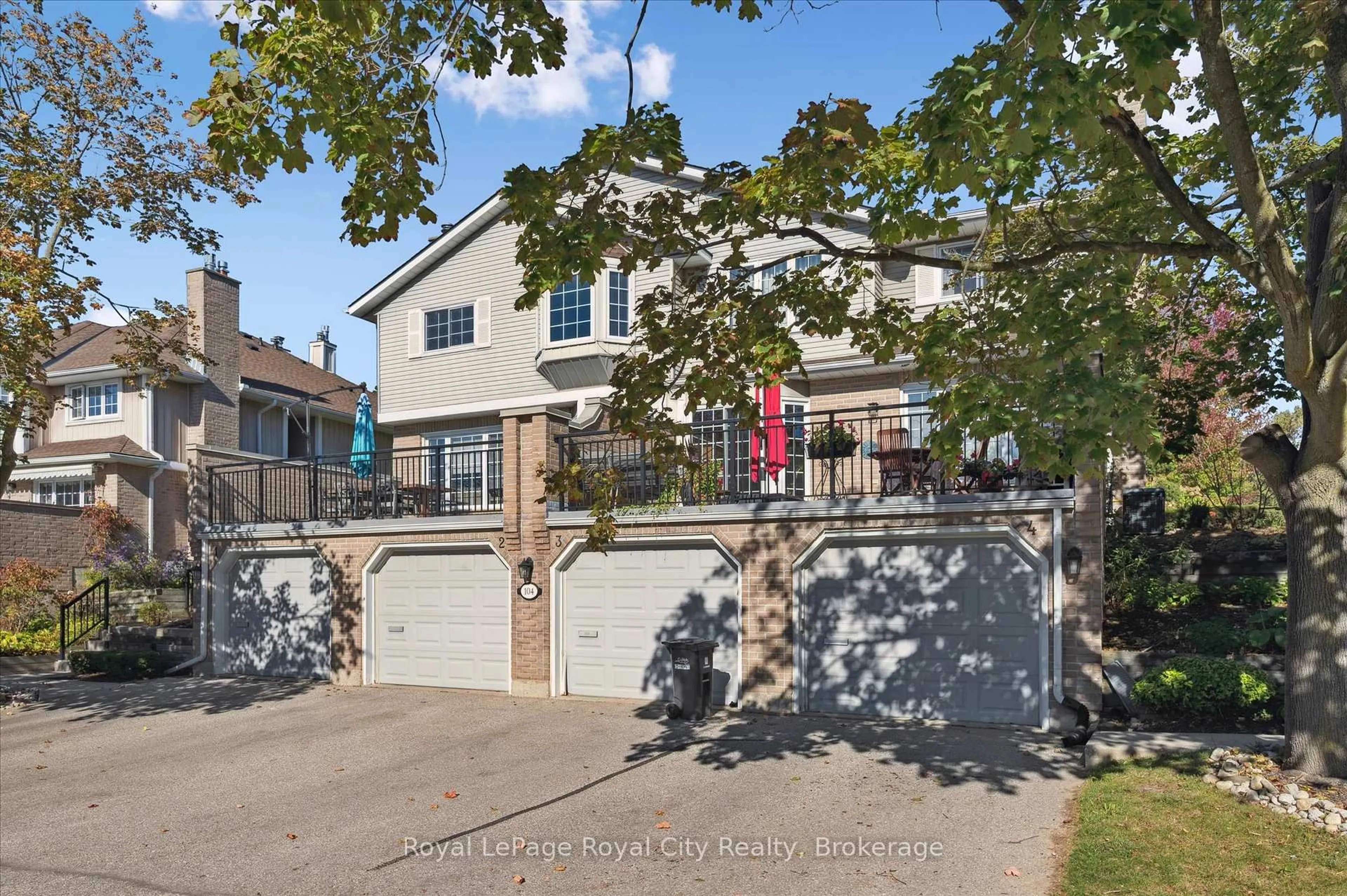 A pic from outside/outdoor area/front of a property/back of a property/a pic from drone, street for 104 Woodlawn Rd #3, Guelph Ontario N1E 1B7