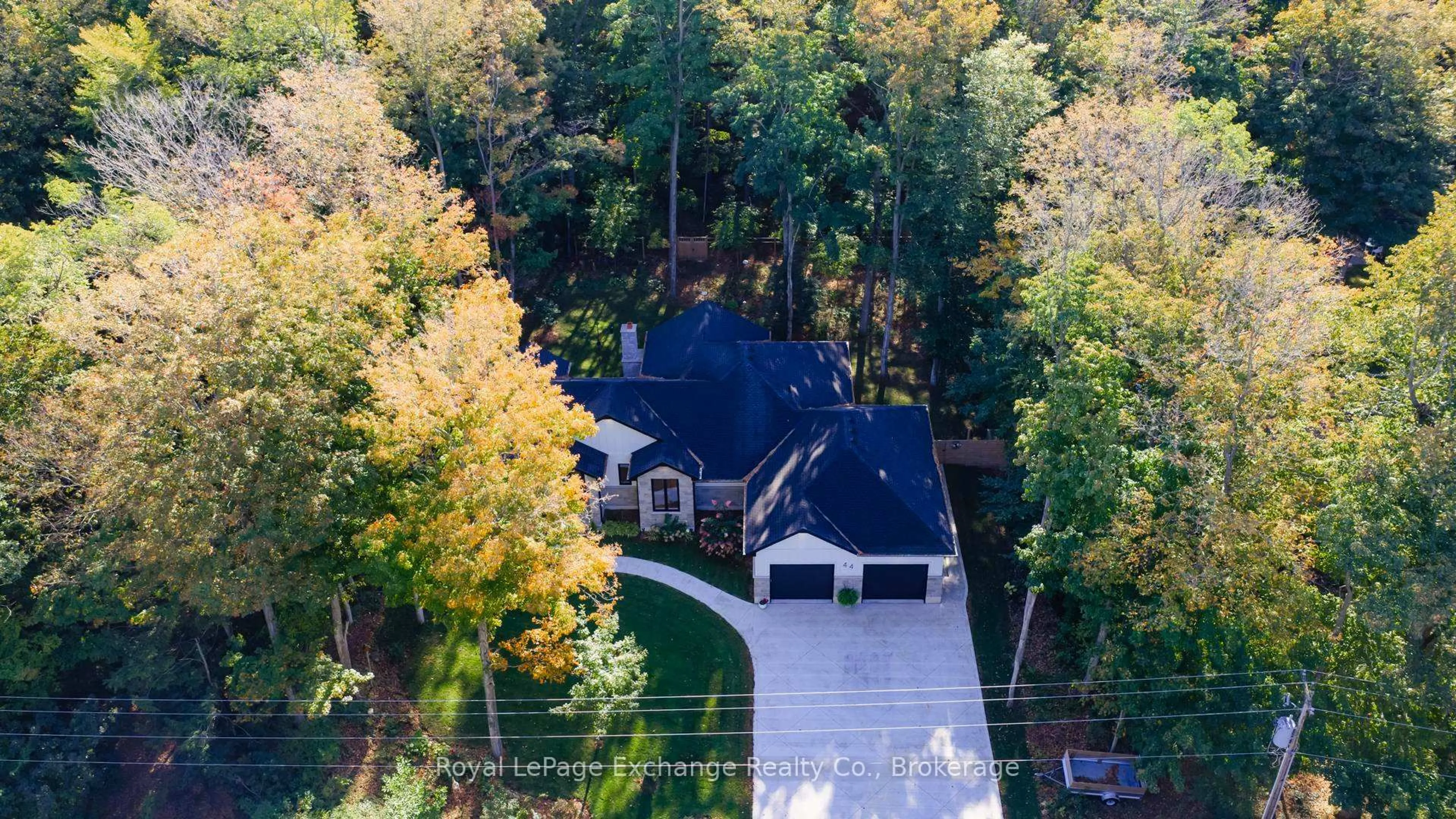 A pic from outside/outdoor area/front of a property/back of a property/a pic from drone, forest/trees view for 44 Blairs Tr, Huron-Kinloss Ontario N2Z 2X3